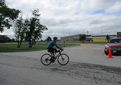 Bike rider at Bluebonnet Express in Texas, showcasing scenic cycling and community events.