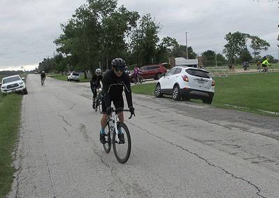 Bicycle riders on a scenic route during Bluebonnet Express cycling event in Texas.