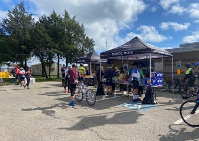 Bright blue sky with cycling event setup at Bluebonnet Express bike ride in Texas.