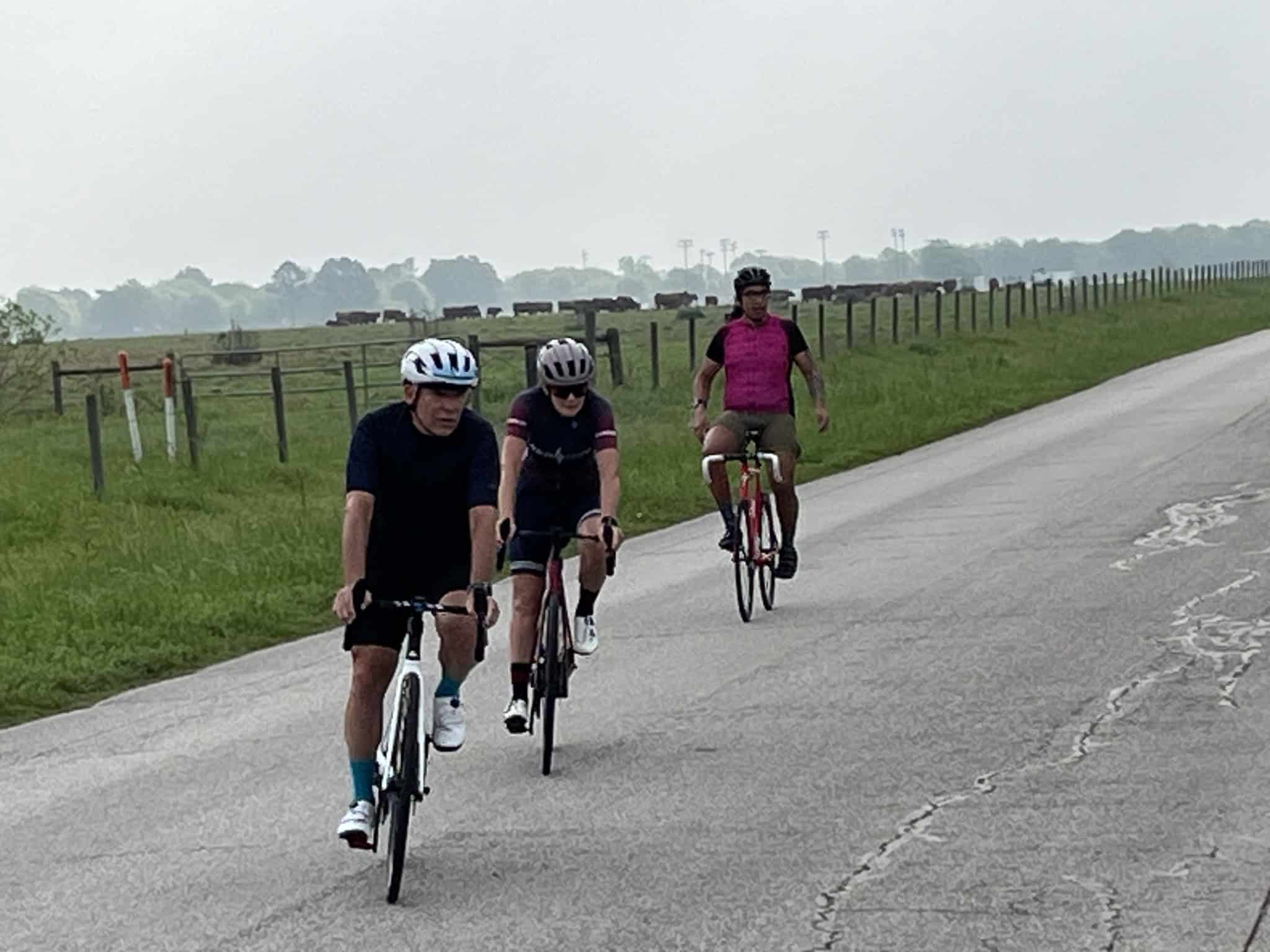 Vibrant cyclists enjoying a scenic ride on the Bluebonnet Express trail in Texas, showcasing outdoor adventures and cycling tourism.