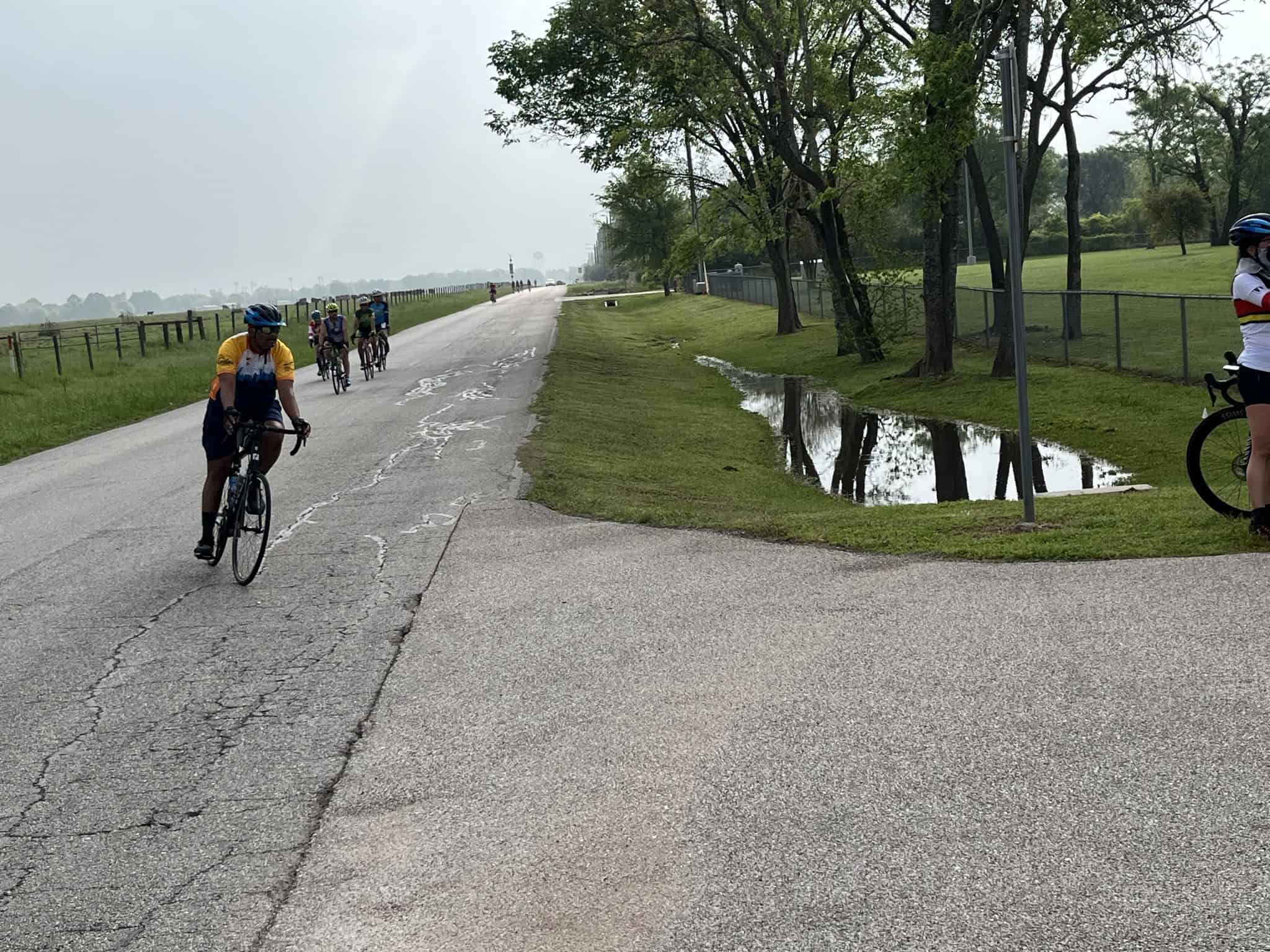 Scenic outdoor biking on a cloudy day at Bluebonnet Express bike trail. Bicycle riders enjoying nature and exercise.