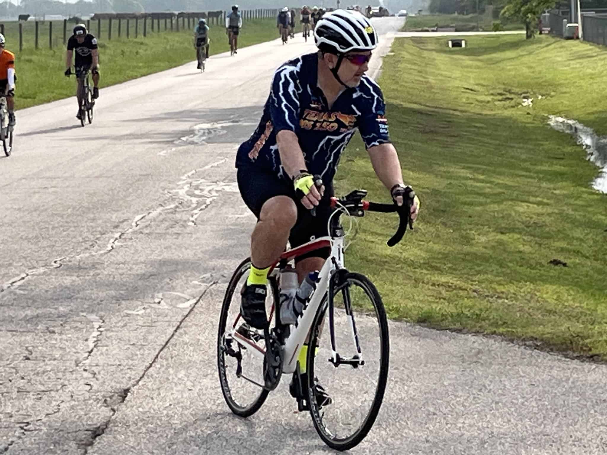 Rider on a Bluebonnet Express cycling route on a scenic outdoor trail.