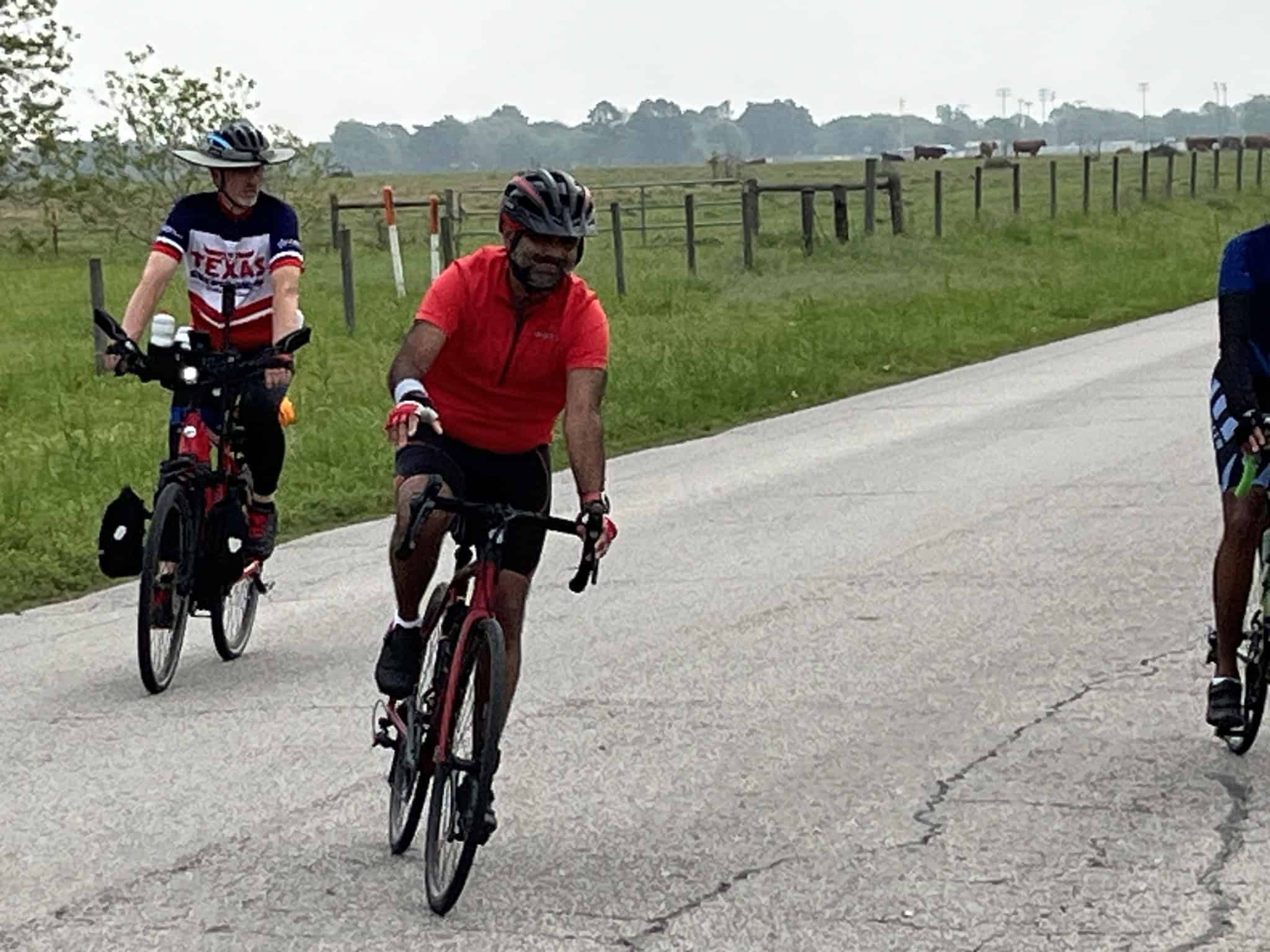 Riders on a scenic Texas countryside bike trail with Bluebonnet Express bicycles, enjoying outdoor cycling.