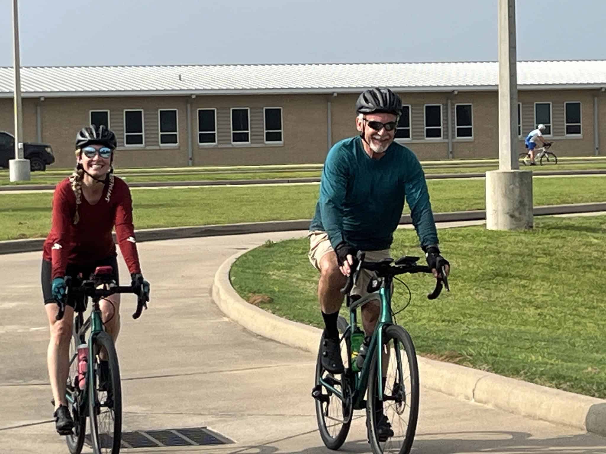 Enjoying a scenic bike ride on Bluebonnet Express trail with family-friendly cycling routes.