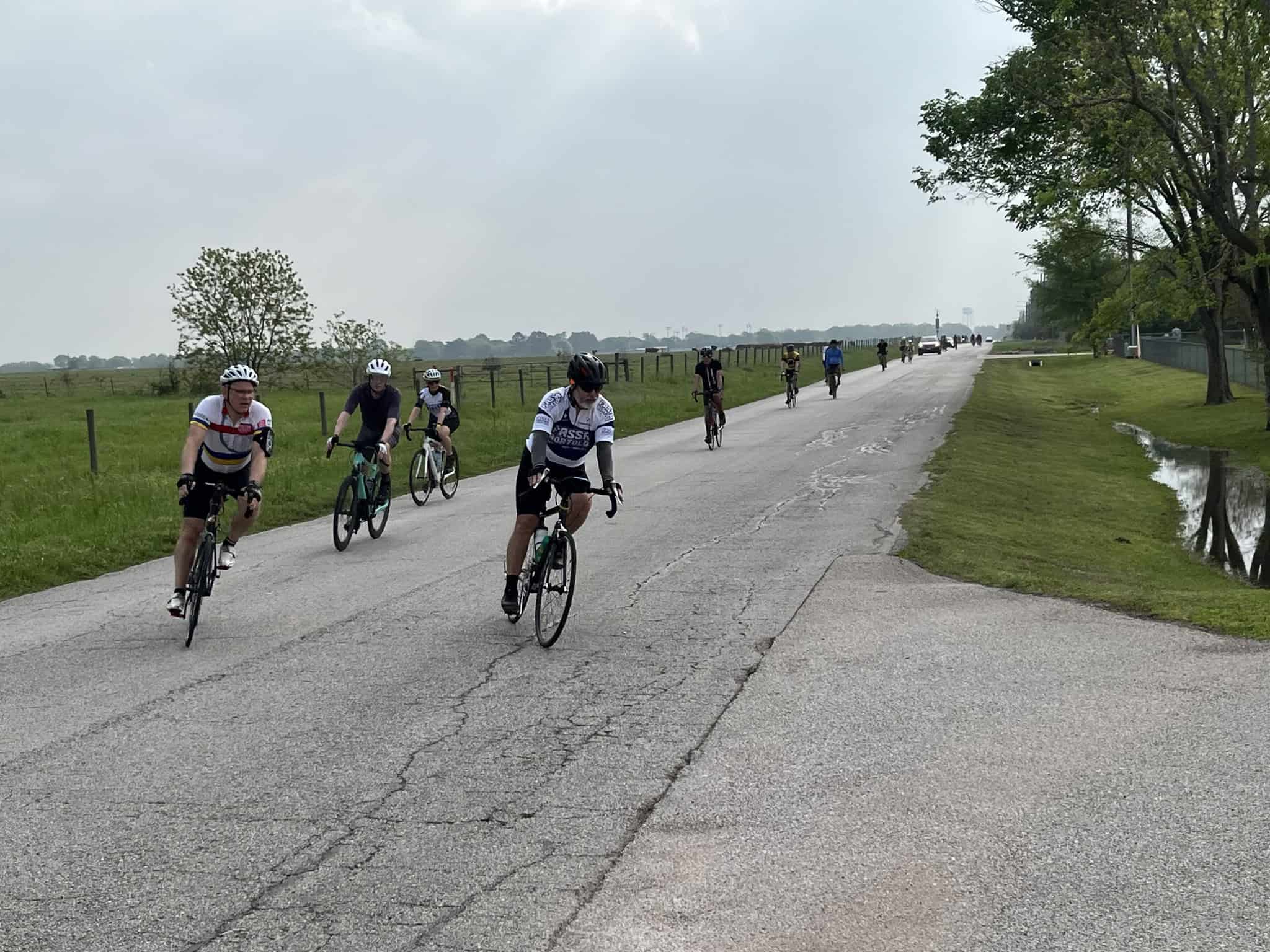 Cyclists riding on a scenic rural bike path in Texas.