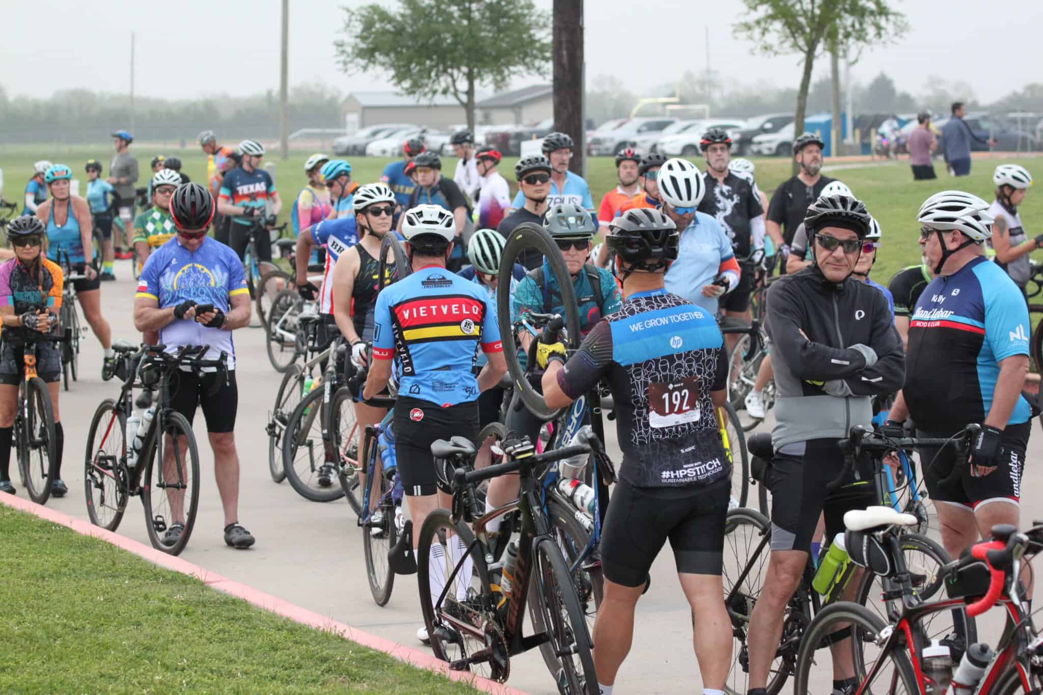 Vibrant group of cyclists at Bluebonnet Express bike event in Texas, promoting outdoor fitness and community.