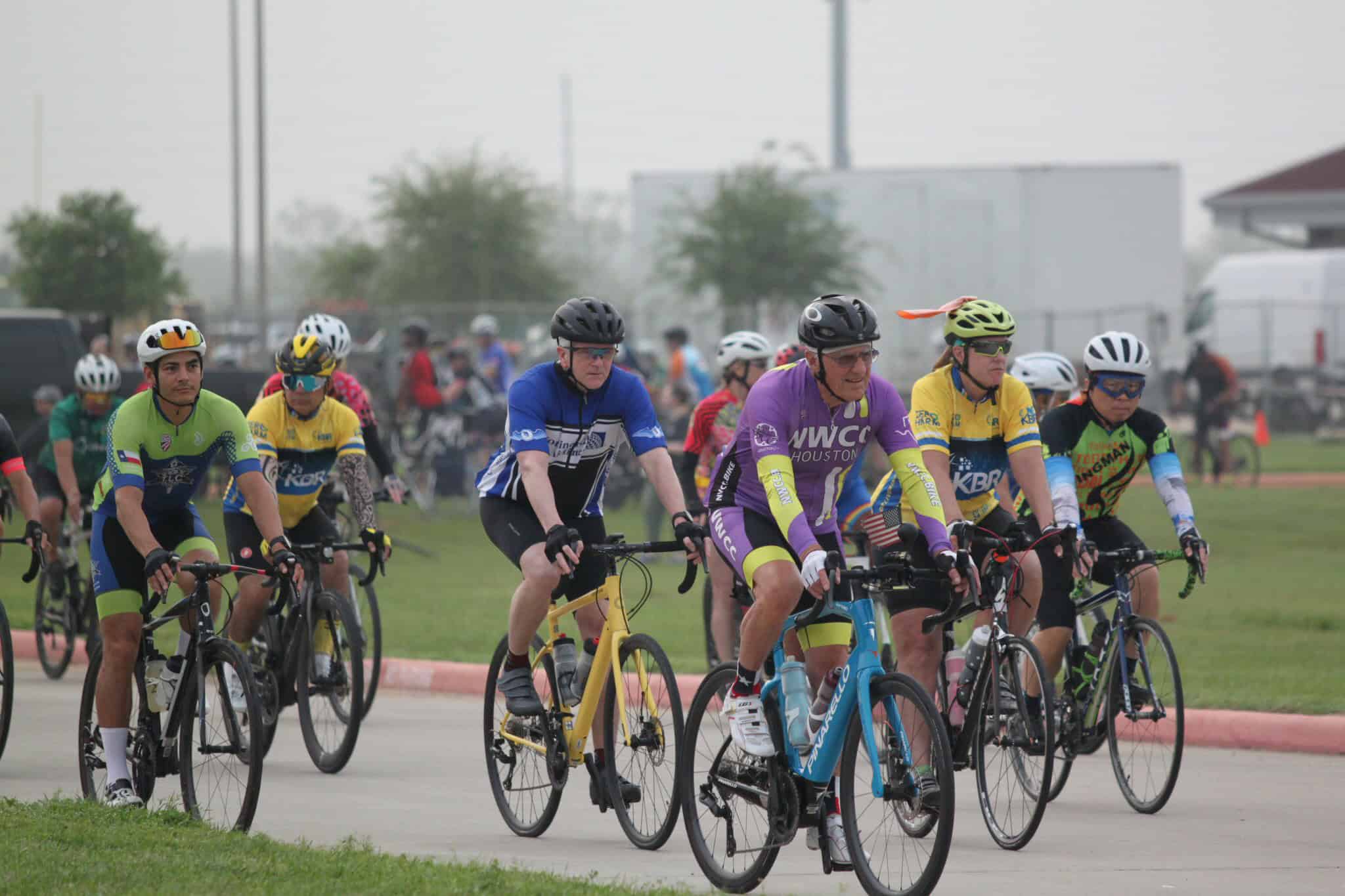 Vibrant cyclists participating in the Bluebonnet Express charity bike race in Texas.