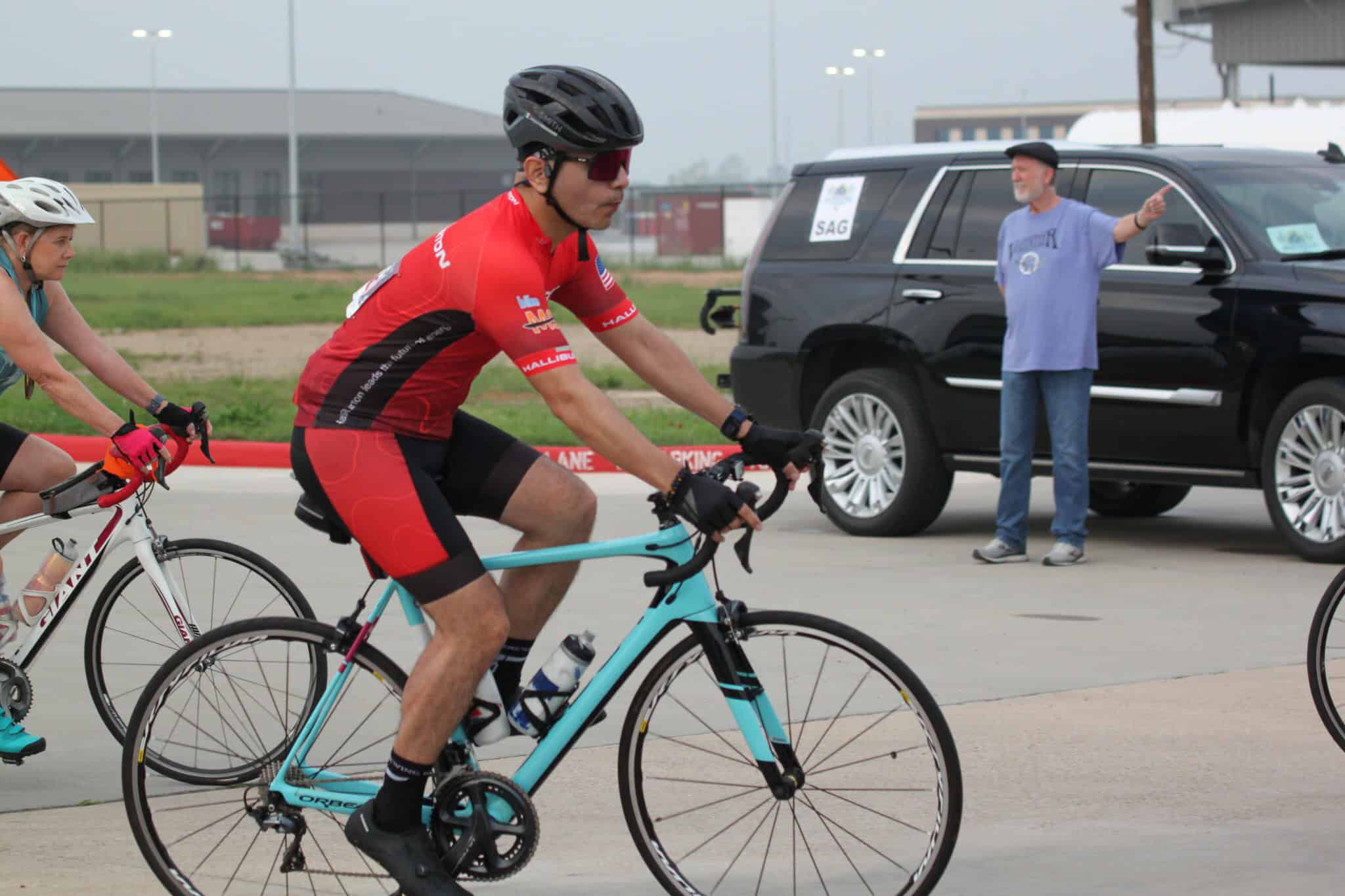 Bicycle rider participating in Bluebonnet Express cycling event in Texas.
