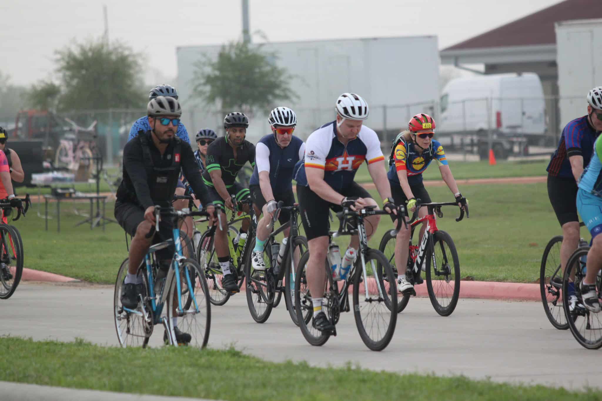 Cyclists riding in a group during a Bluebonnet Express bike event, promoting cycling and active outdoor recreation.