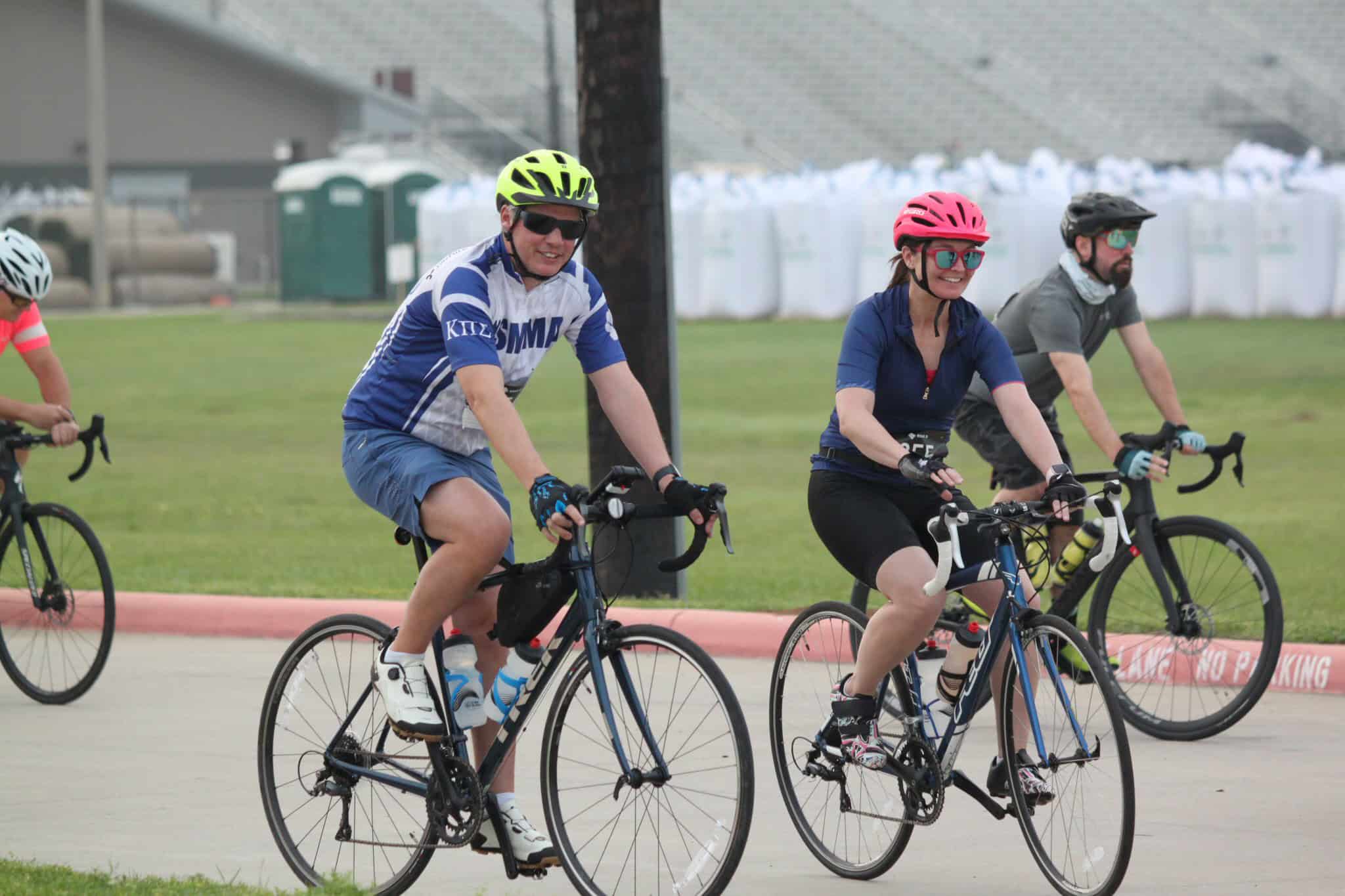 Cyclists riding together during Bluebonnet Express event, promoting community cycling and fitness.