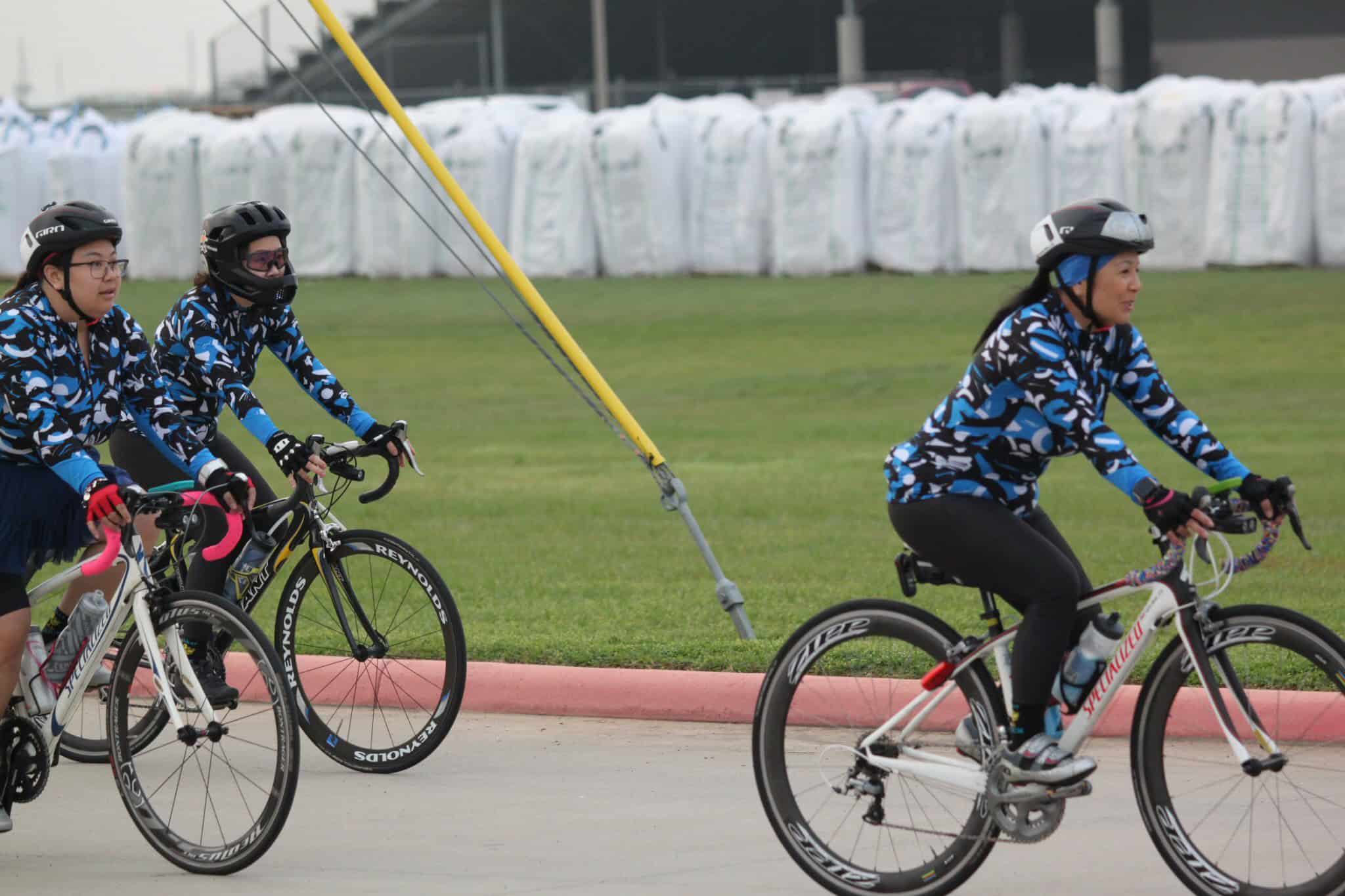 High-performance cycling team participating in Bluebonnet Express race, showcasing sport and endurance.
