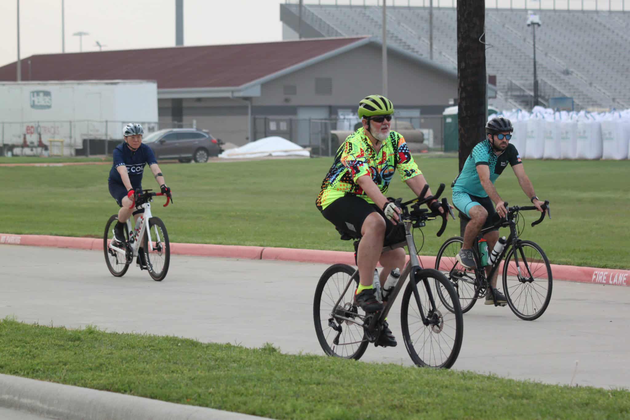 Vintage bike ride on Bluebonnet Express route featuring cyclists enjoying scenic Texas trails.