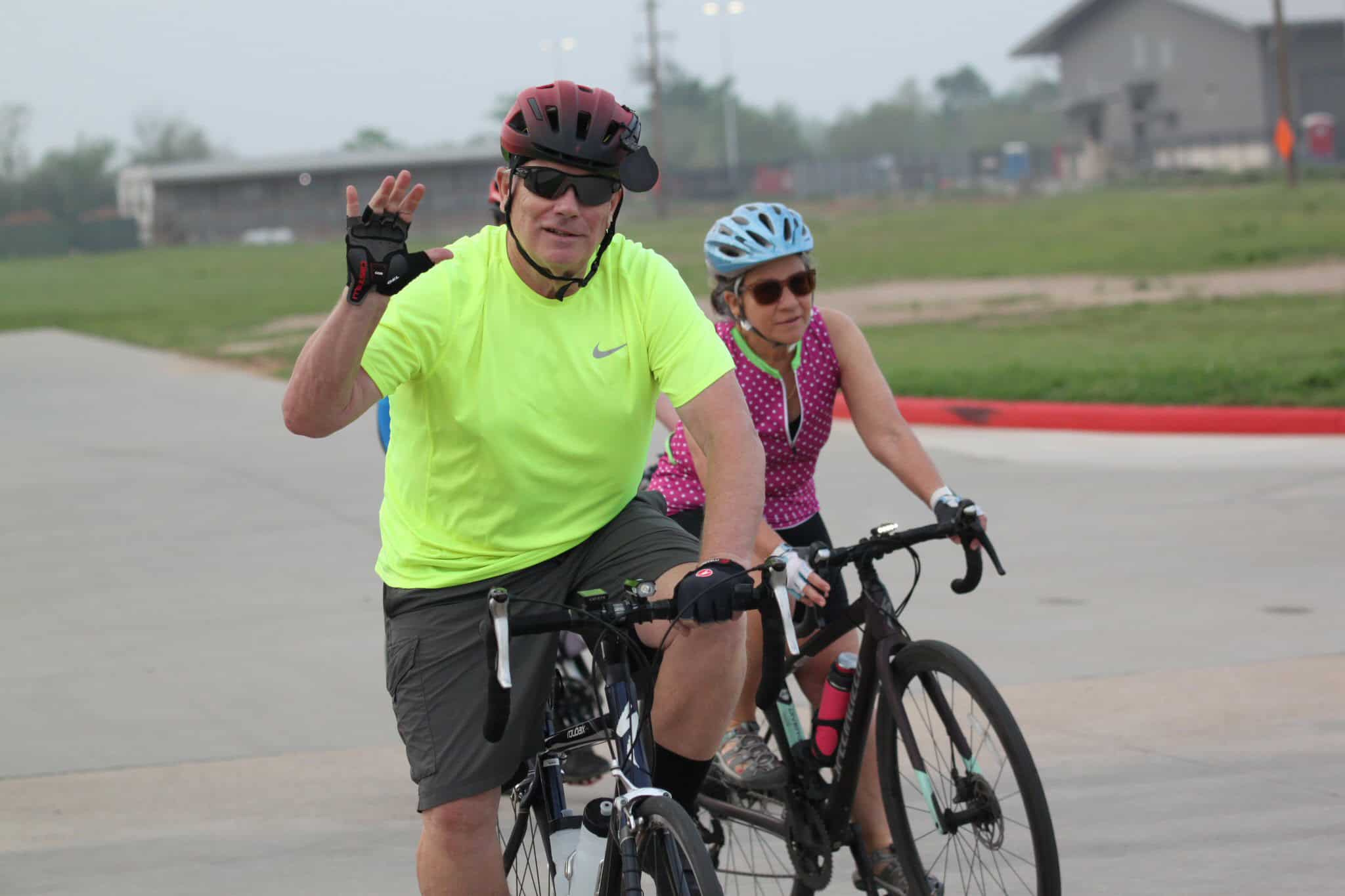 Vintage cycling bike ride with sport helmets and sunglasses.