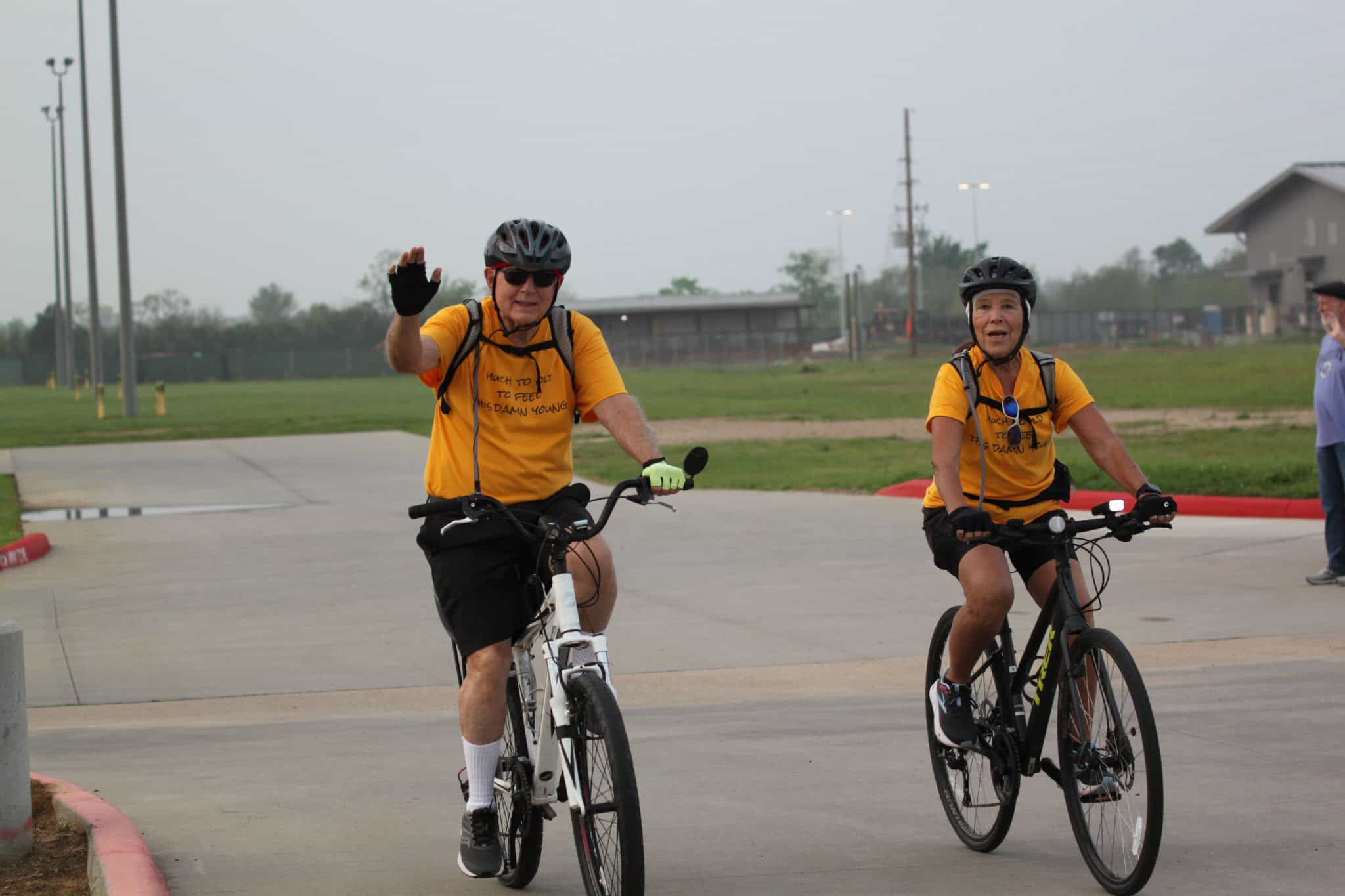 Enjoying a scenic bike ride with fellow cyclists on Bluebonnet Express trail, a popular Texas biking route.