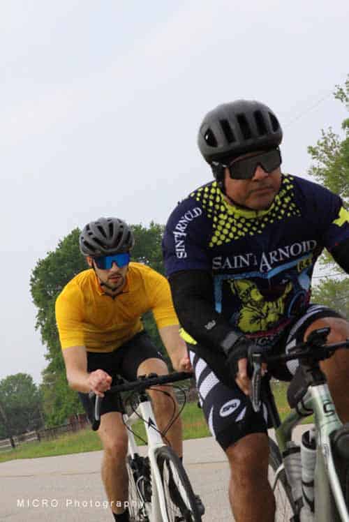 1. Cyclists riding on a scenic outdoor trail during Bluebonnet Express event.
