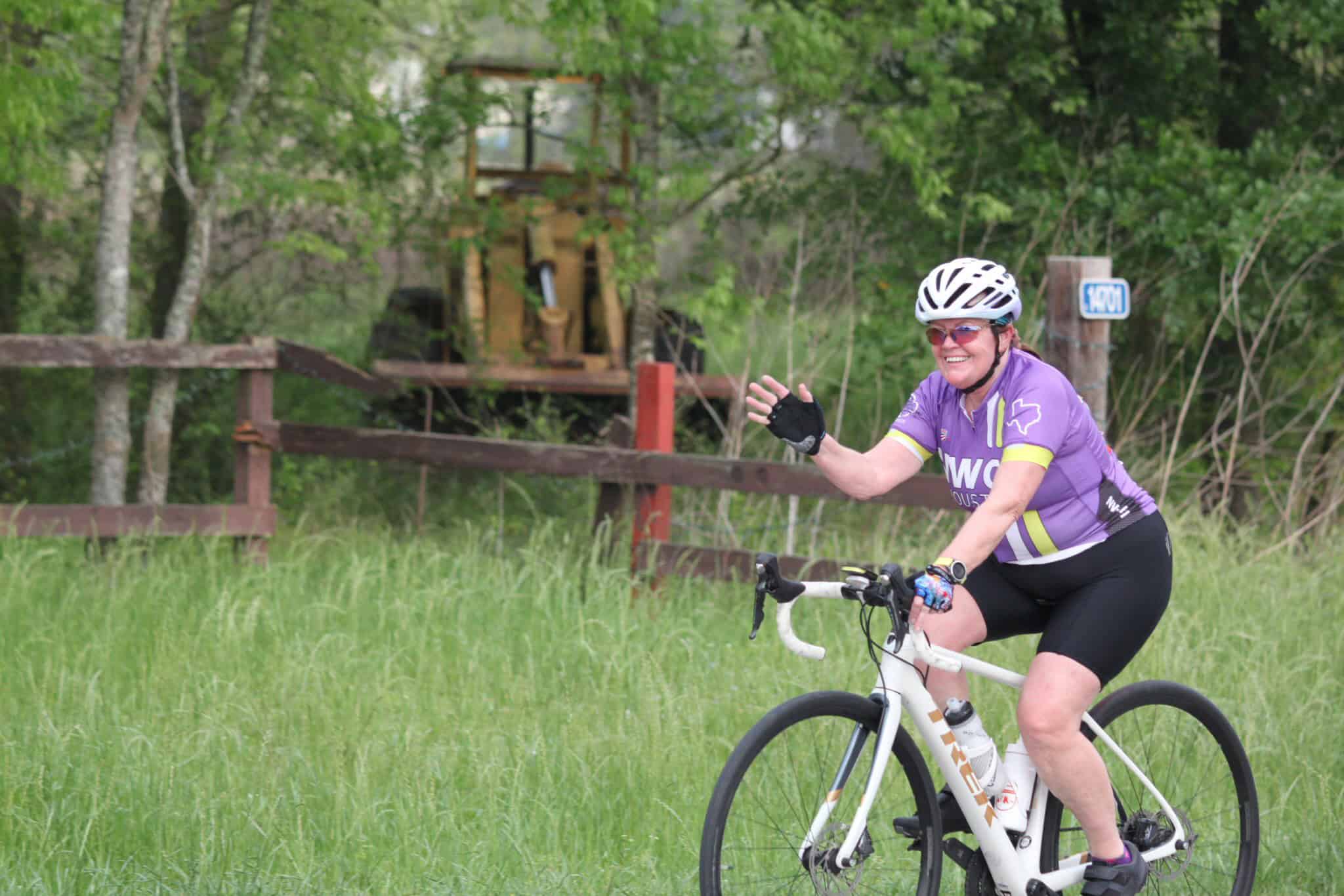 Vibrant cyclist enjoying the outdoors on Bluebonnet Express bike trail.