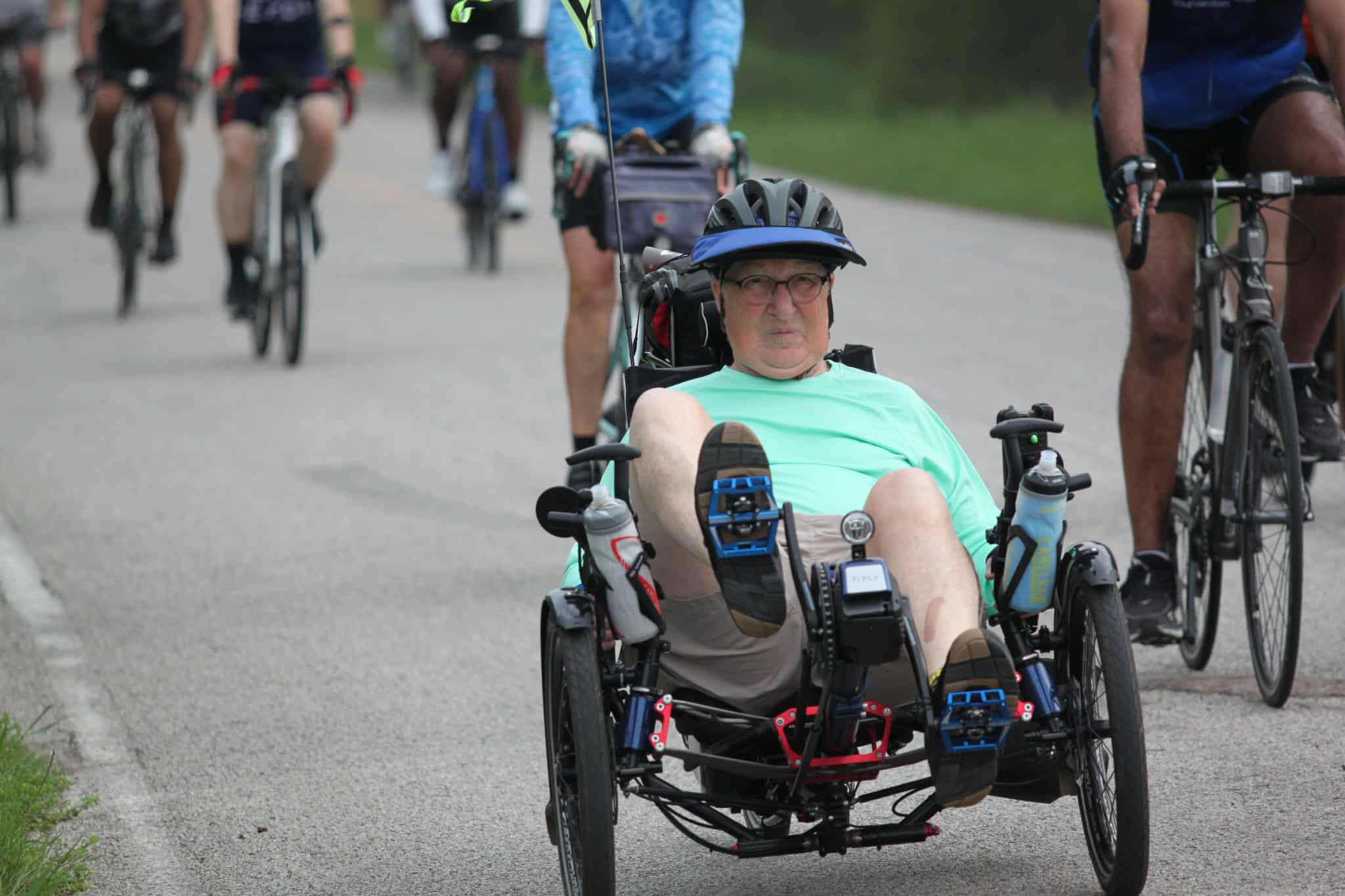 Disabled cyclist participating in Bluebonnet Express ride, enjoying inclusive biking event.
