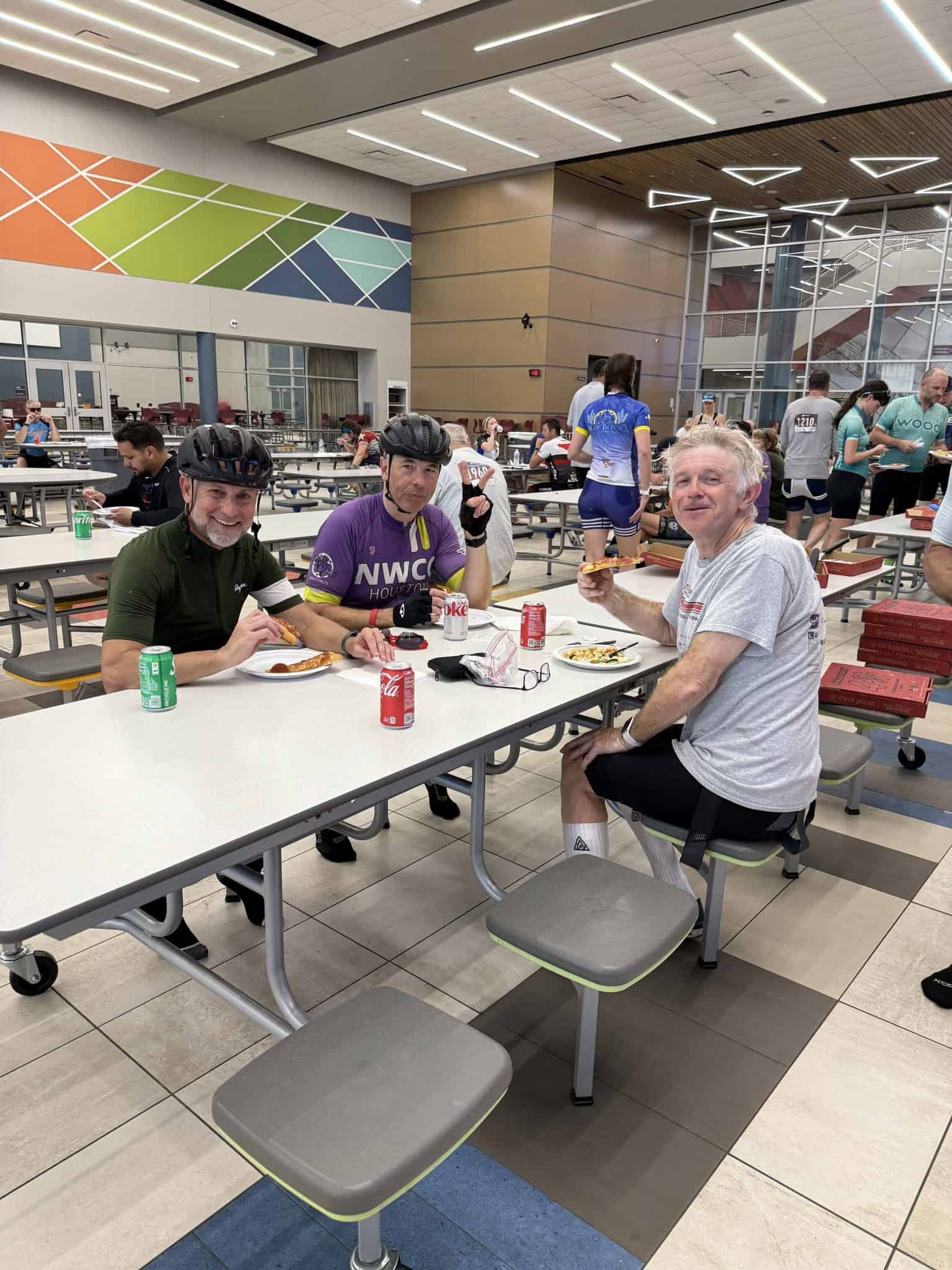 Bike race participants enjoying a meal at the Bluebonnet Express post-race gathering.