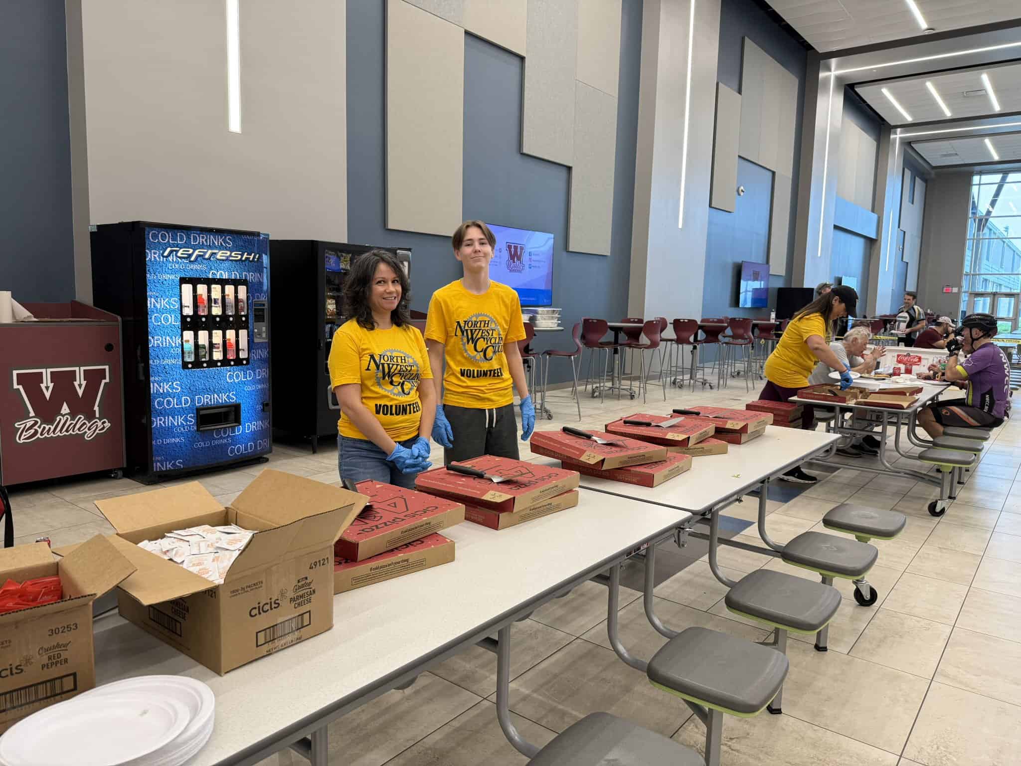 Volunteers preparing food for Bluebonnet Express event at West Texas A&M University.