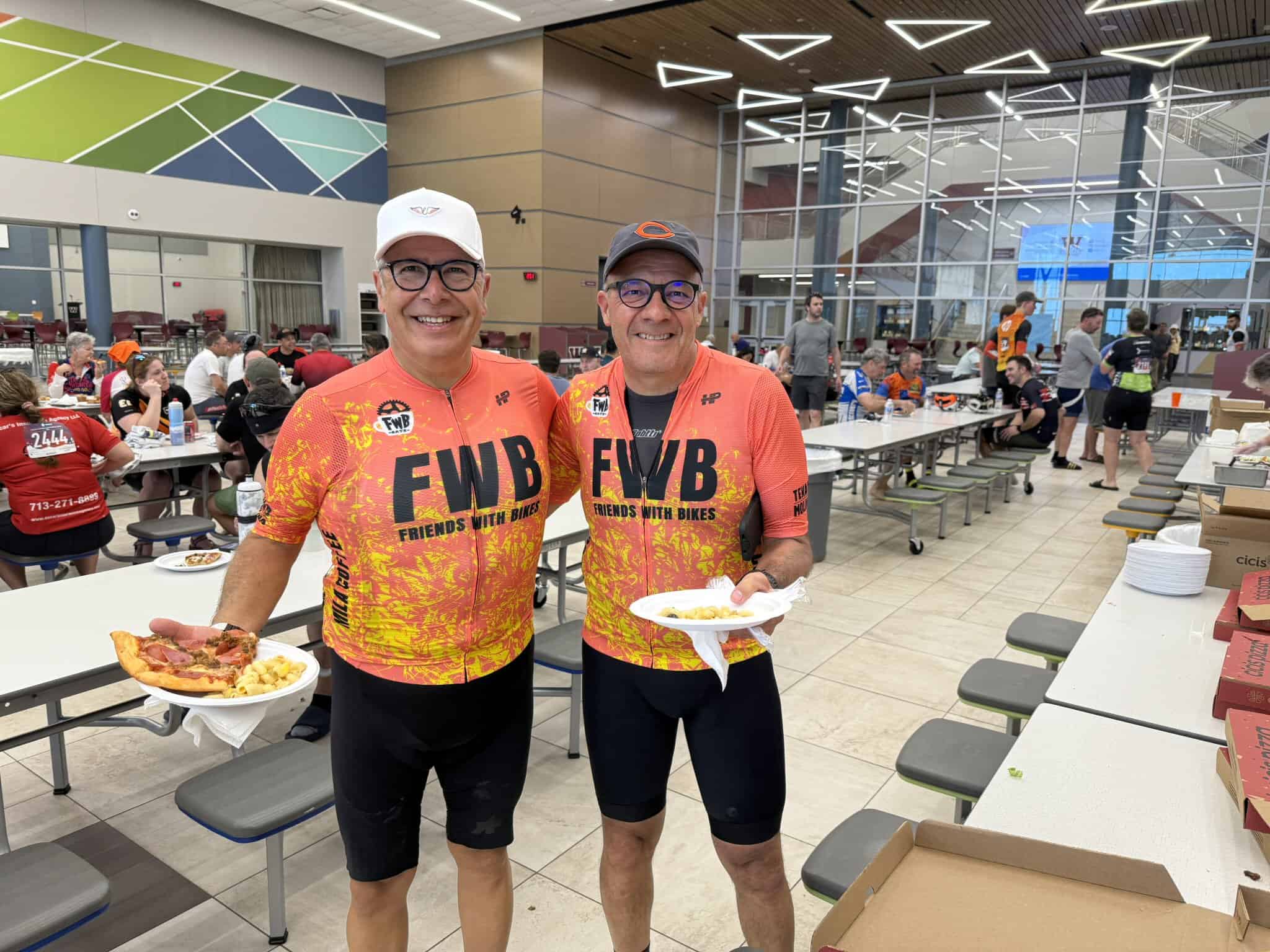 Enjoying post-ride pizza at Bluebonnet Express cycling event with Friends With Bikes.