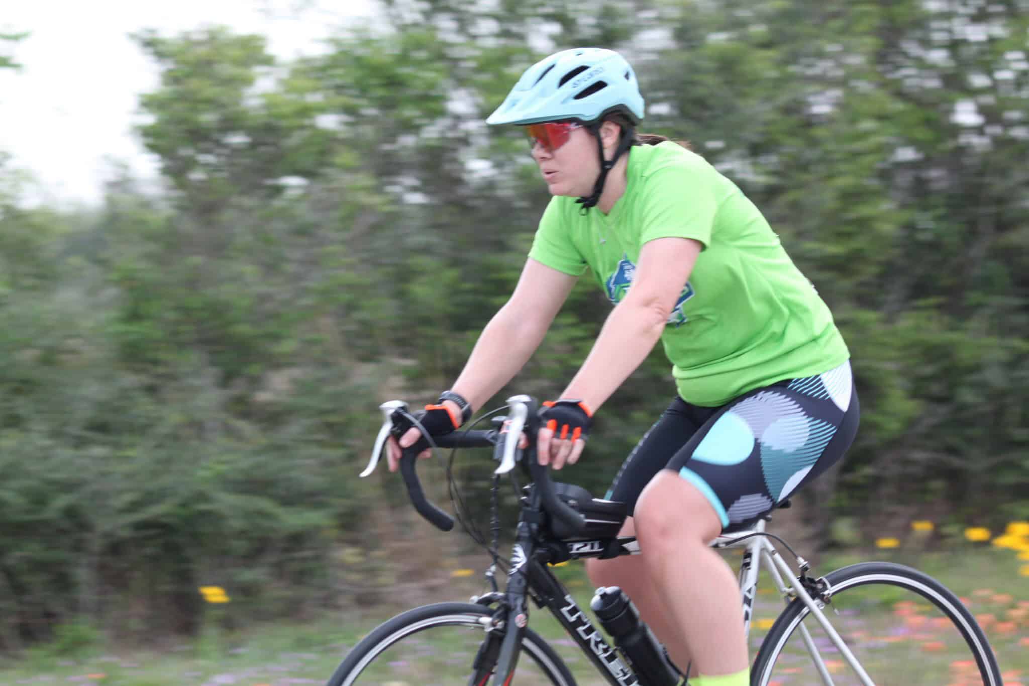 Bright green cycling jersey for Bluebonnet Express bike ride event.