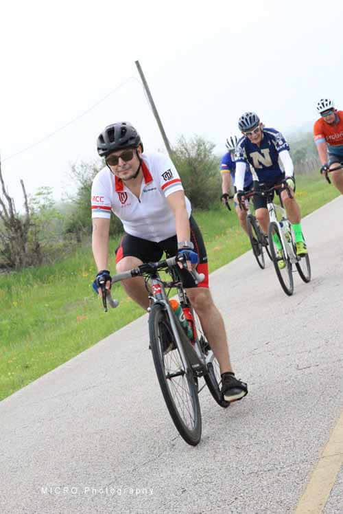 Inclusive bike ride during Bluebonnet Express event on scenic rural roads for cycling enthusiasts.