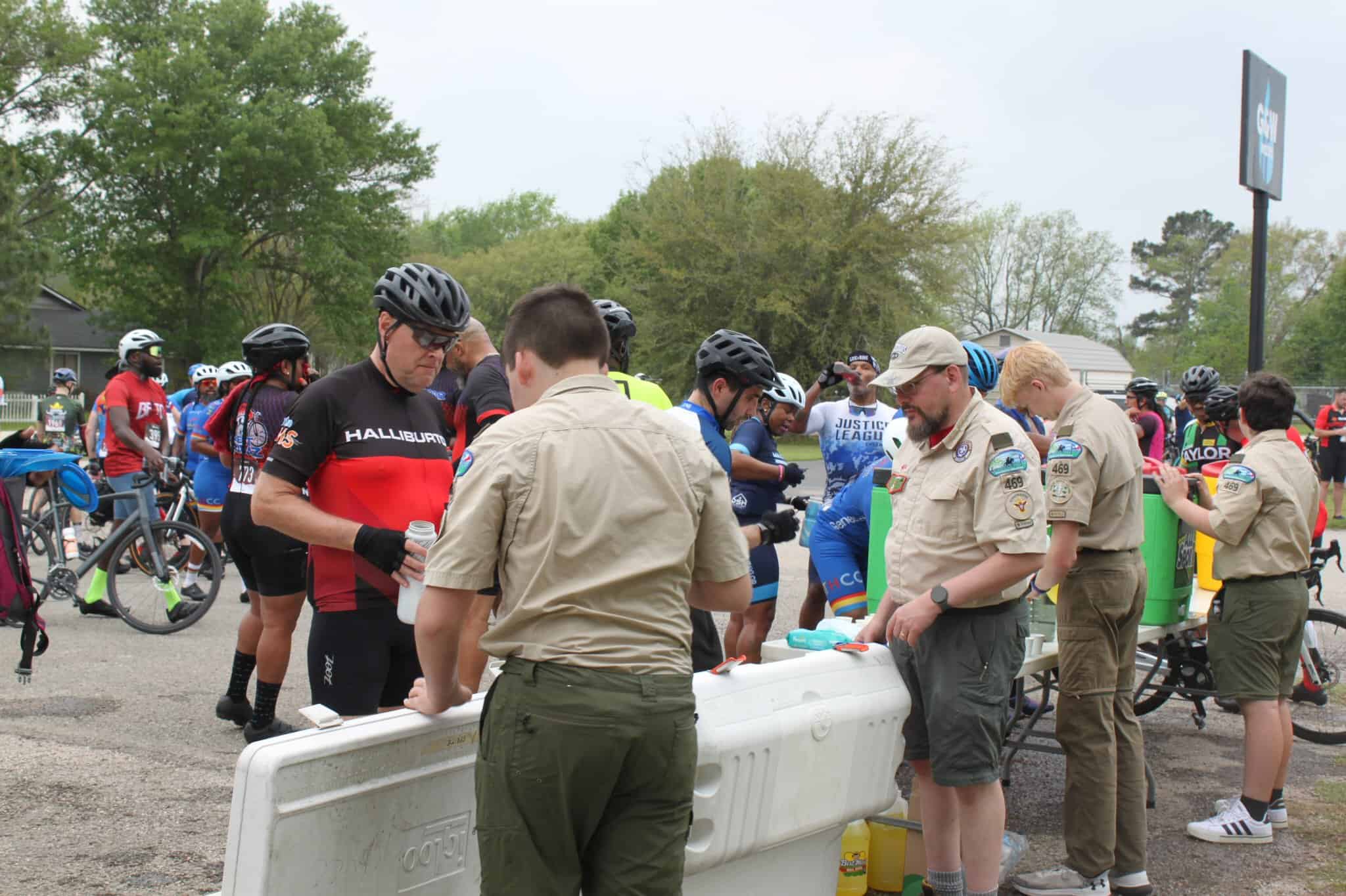 Hydration station at Bluebonnet Express cycling event, supported by volunteers.
