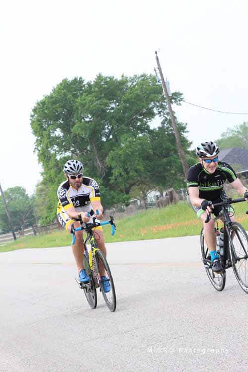 Active cyclists riding on a sunny day in Bluebonnet Express event, promoting outdoor biking and health.