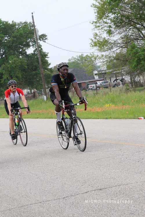 Bicycle riders participating in Bluebonnet Express charity bike ride outdoors.