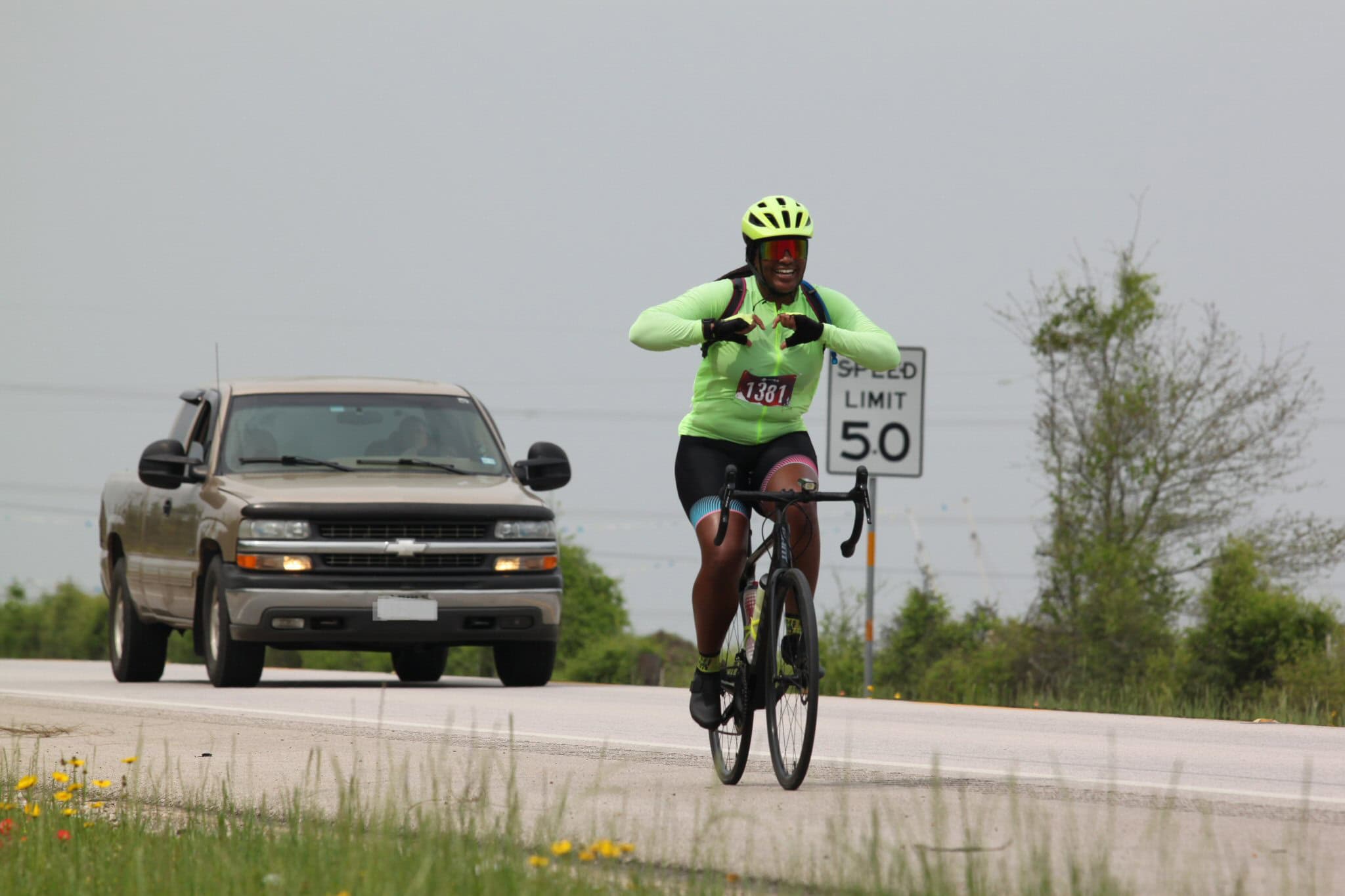 Bright cyclist on a mountain bike, showcasing Bluebonnet Express cycling event, active outdoor sports, and fitness.