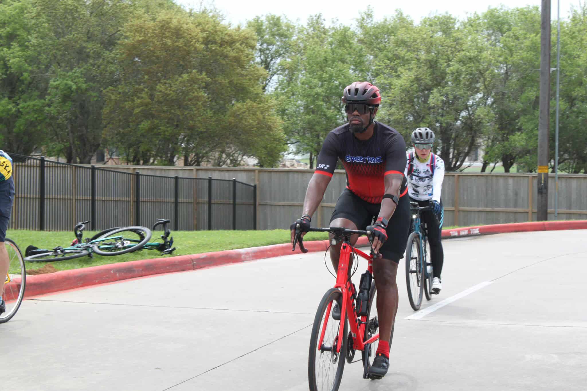 Bright cyclist riding a bike during Bluebonnet Express cycling event, showcasing outdoor sports and cycling community engagement.