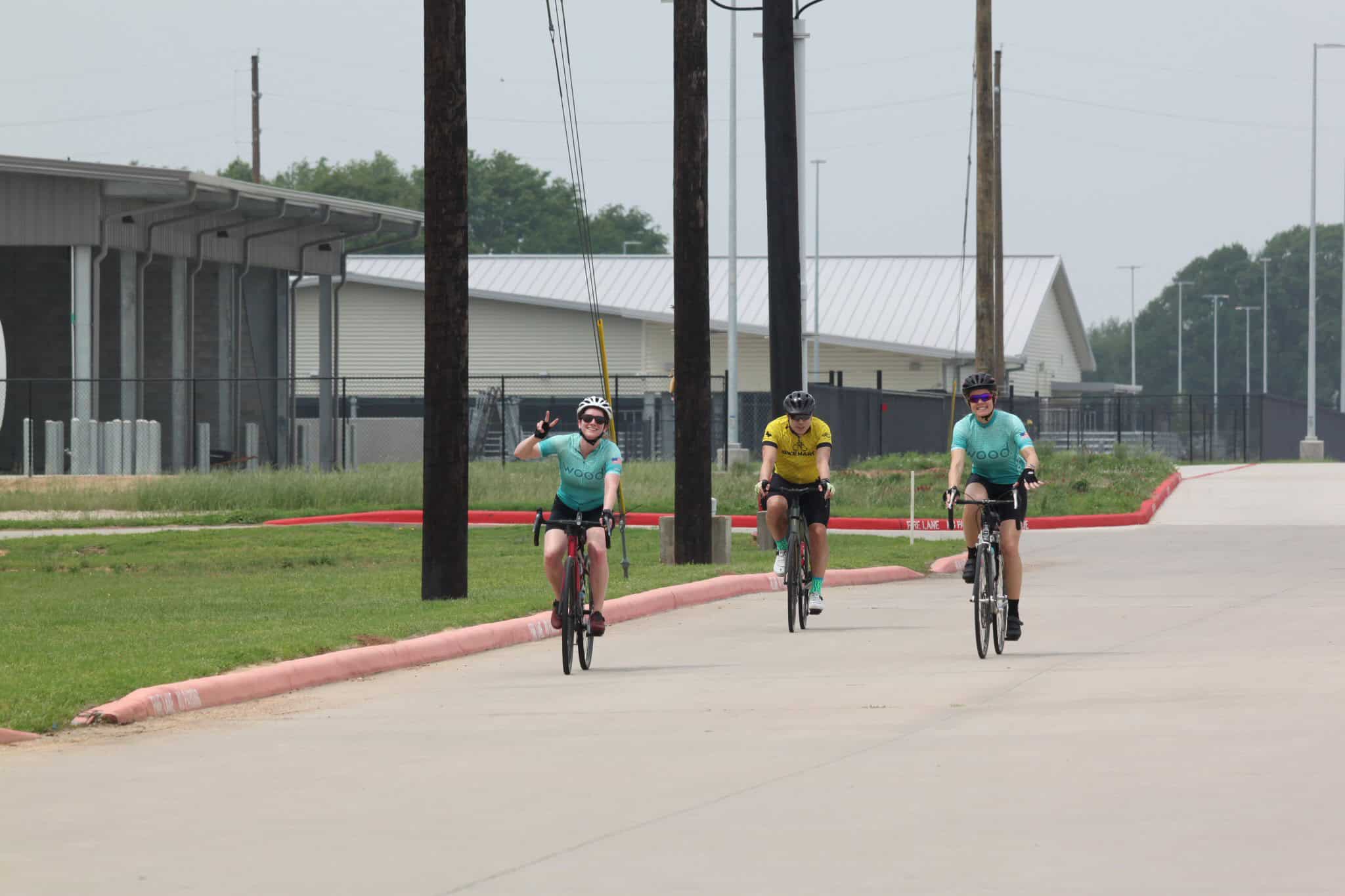 Cyclists enjoying a ride on the Bluebonnet Express bike trail in Texas.