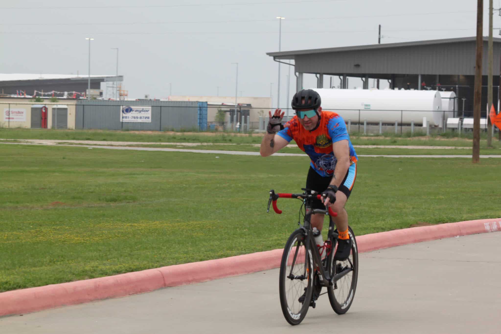 Riders riding bikes on the Bluebonnet Express bike trail in Texas, offering scenic cycling routes.
