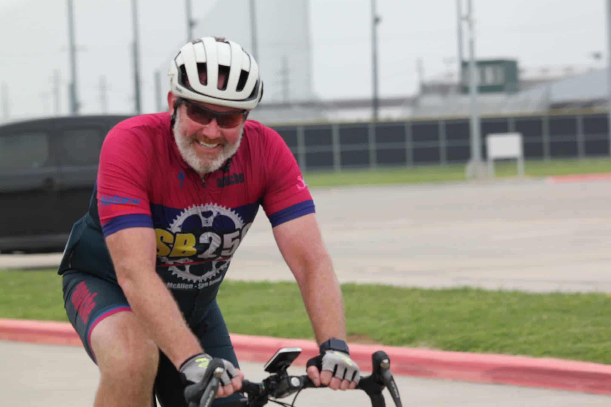 Energetic cyclist enjoying Bluebonnet Express bike race, showcasing passion for cycling and adventure.
