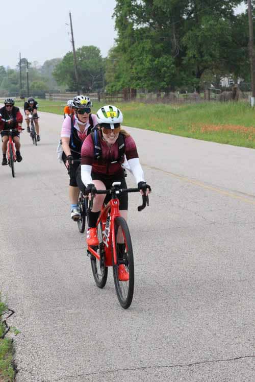 Children's group bike ride during Bluebonnet Express event in Texas.