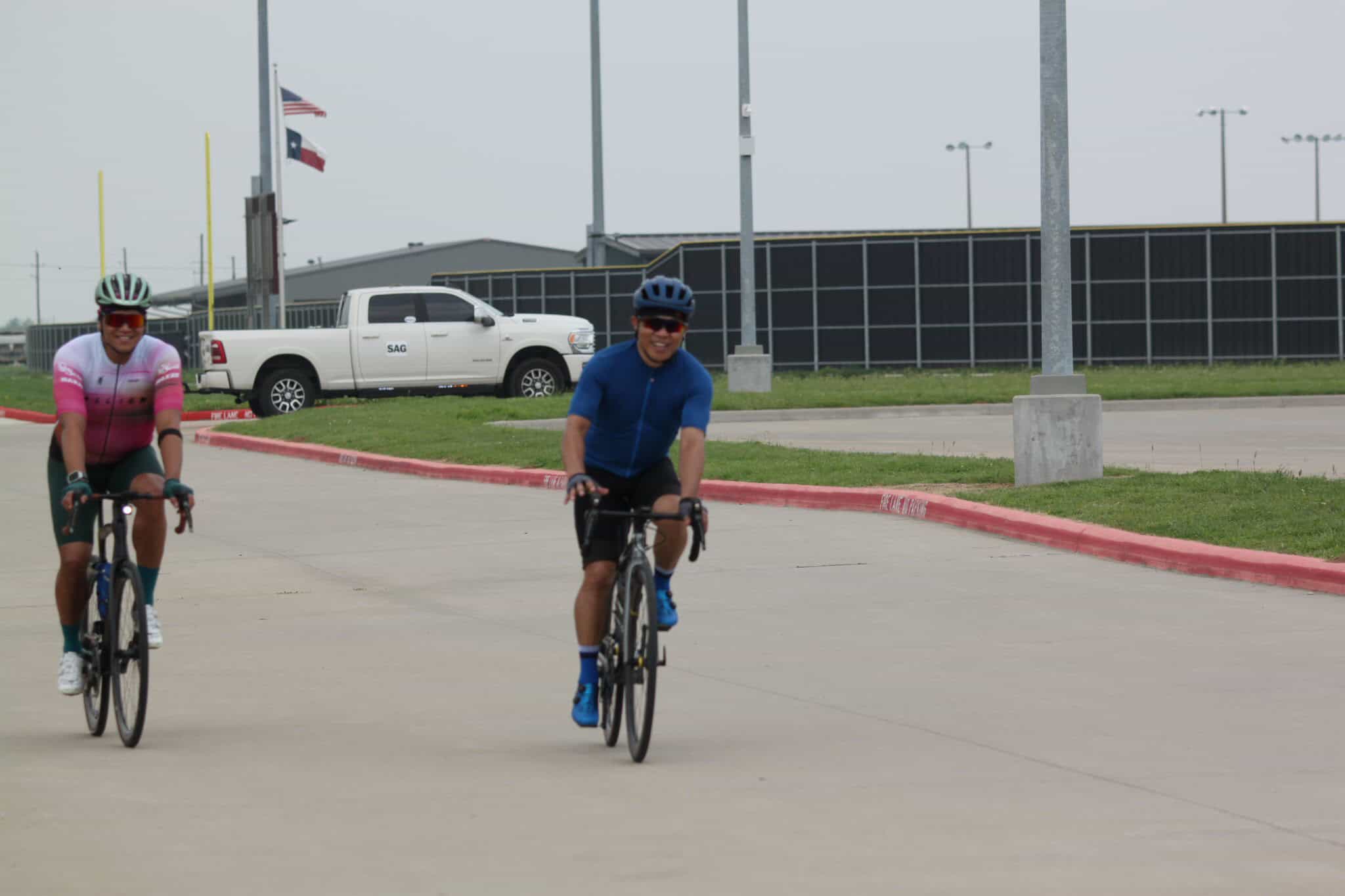 Smooth riding on Bluebonnet Express bike trail with cyclists enjoying outdoor exercise.