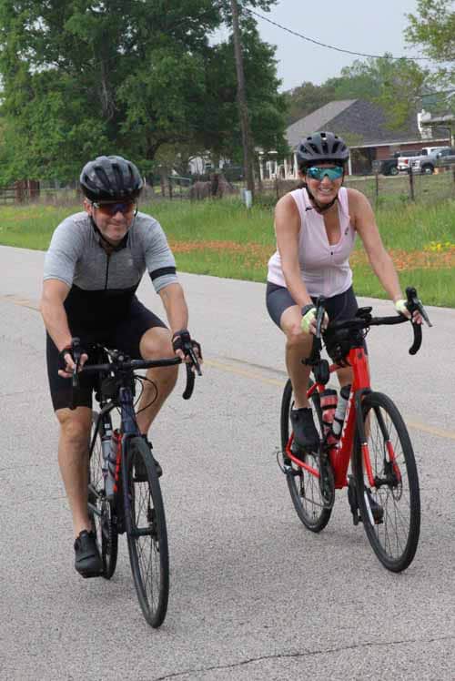 Active cyclists enjoying the scenic ride on Bluebonnet Express trail.