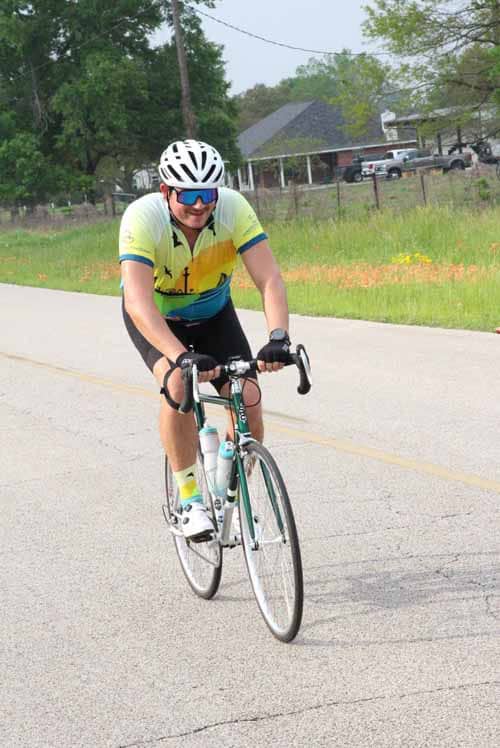 Bike rider on the Bluebonnet Express ride in Houston, Texas, showcasing outdoor adventure and scenic cycling routes for bike enthusiasts.