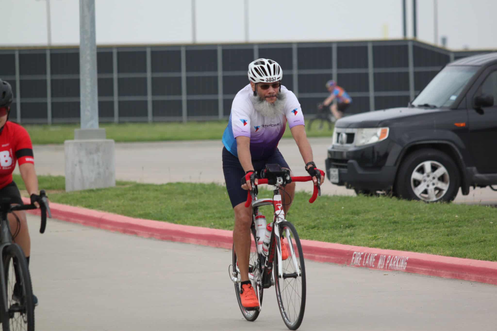 Cyclist riding during the Bluebonnet Express outdoor bike event, showcasing cycling enthusiasts and scenic route.