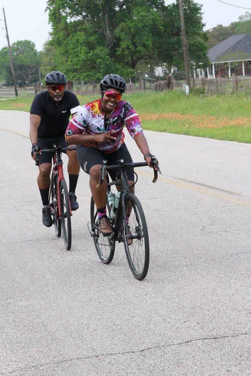 Enjoying a scenic bike ride on the Bluebonnet Express in Texas with friends. Perfect for outdoor cycling adventures.