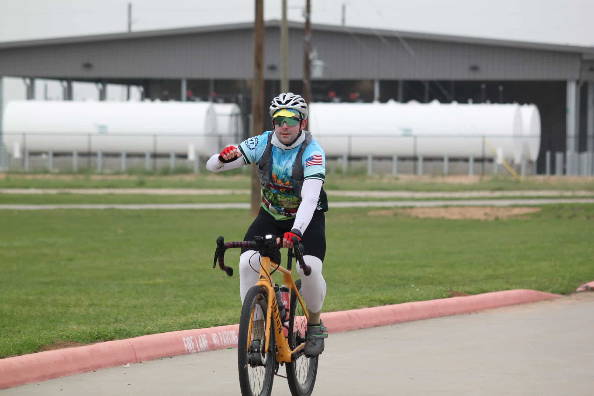 High-performance cycling on Bluebonnet Express trail, promoting eco-friendly transportation and fitness.