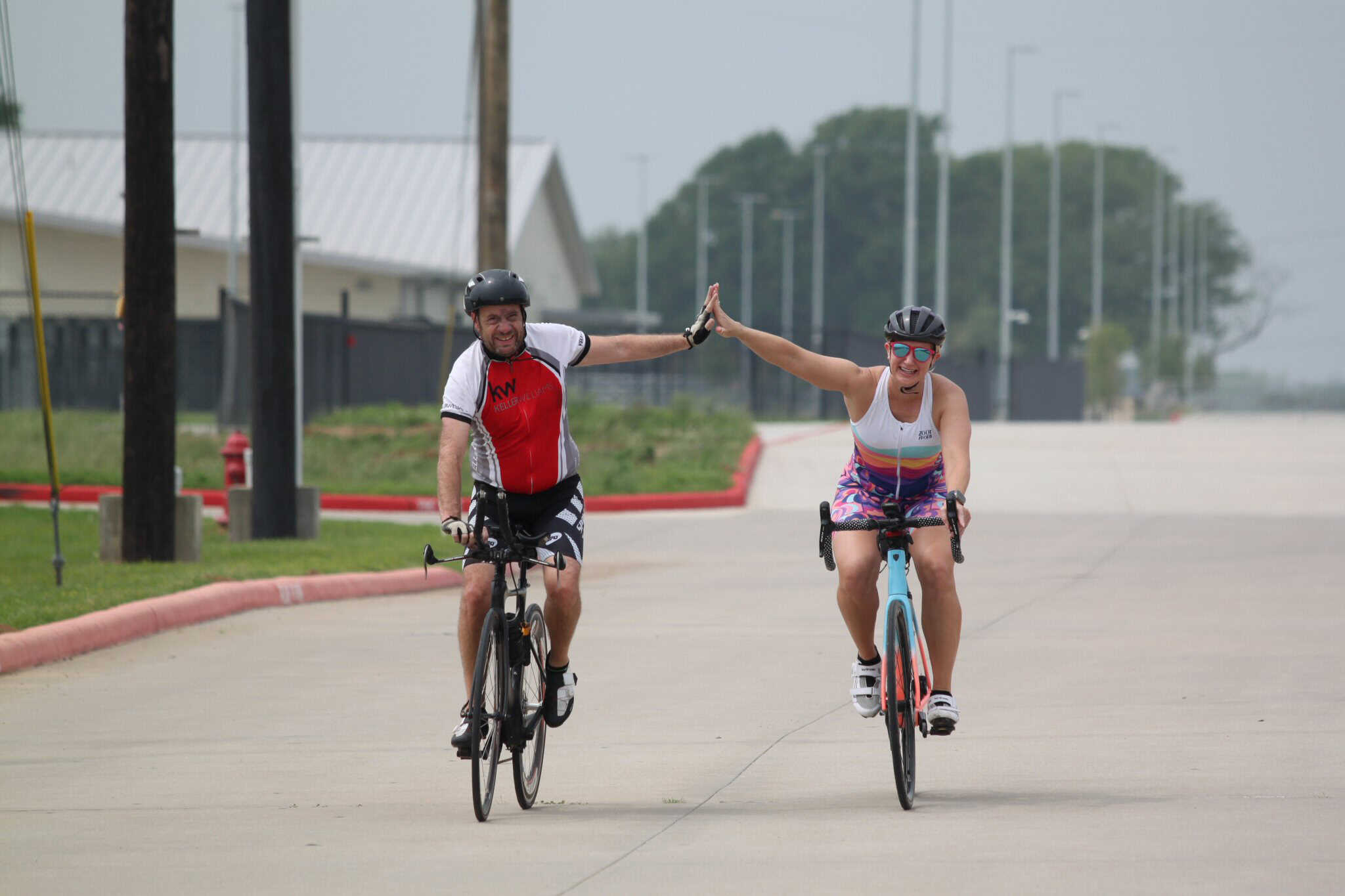 High-energy cyclists enjoying Bluebonnet Express ride, highlighting fun, fitness, and community.