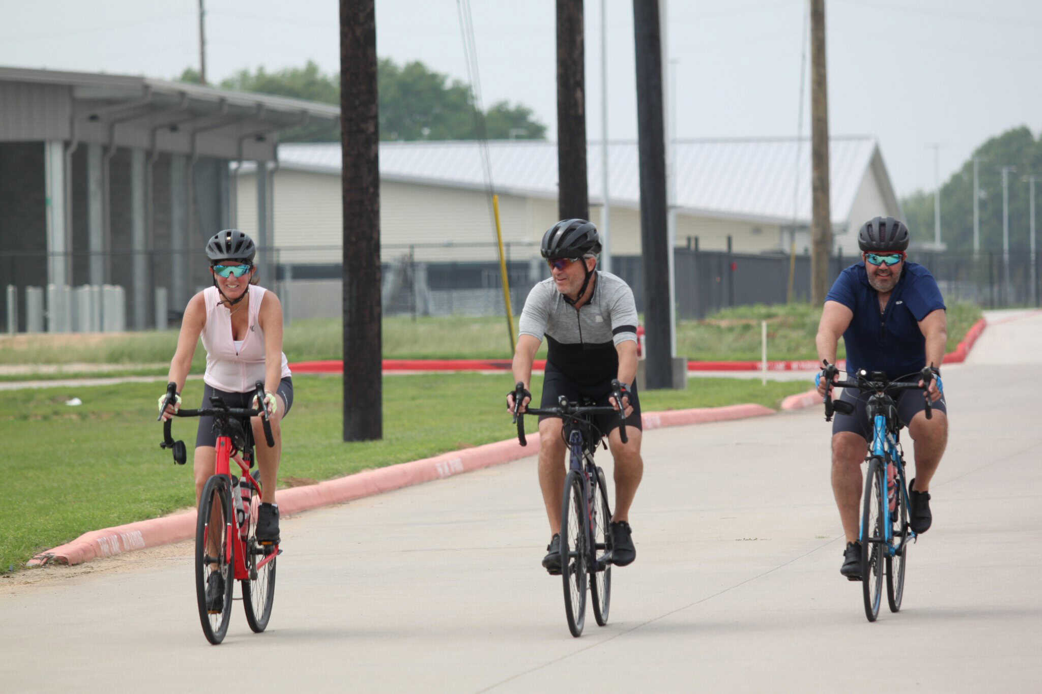 Velo riders enjoying a scenic ride on the Bluebonnet Express bike trail in Texas.