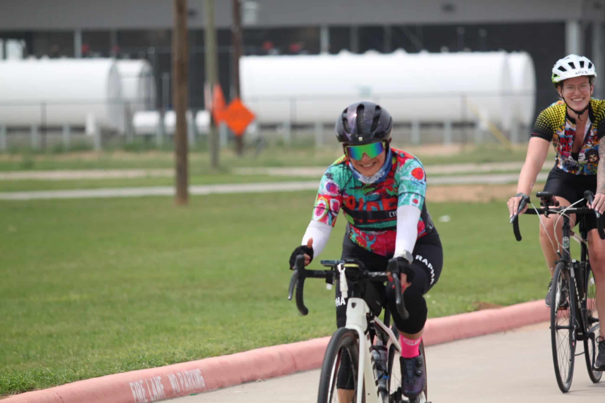 Brightly colored cyclist enjoying a ride on Bluebonnet Express route, showcasing fun and active outdoor biking.