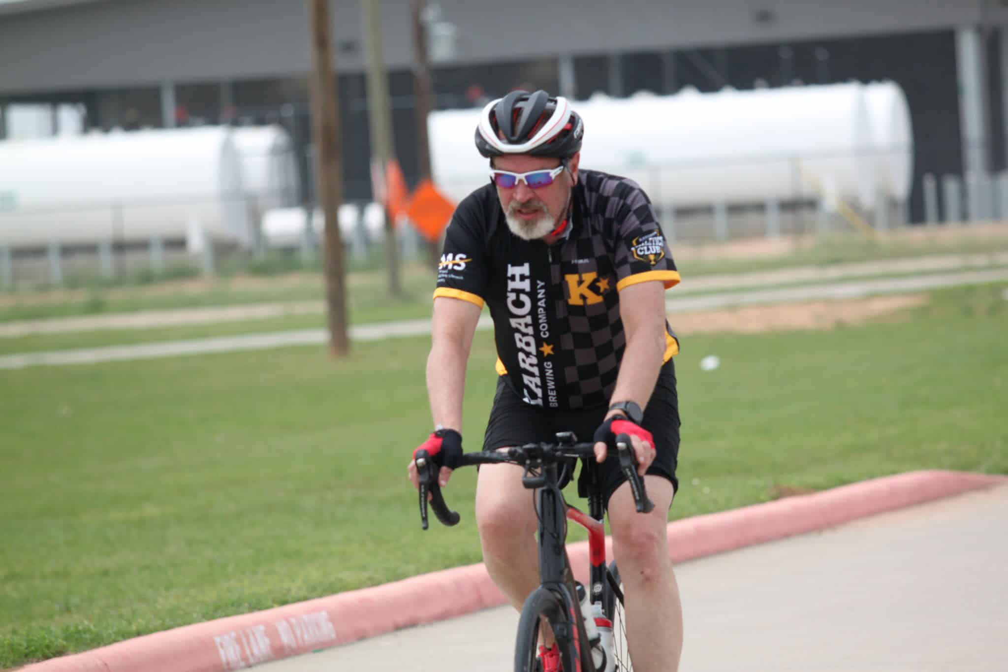 Bike rider enjoying a scenic ride with Bluebonnet Express cycling event.