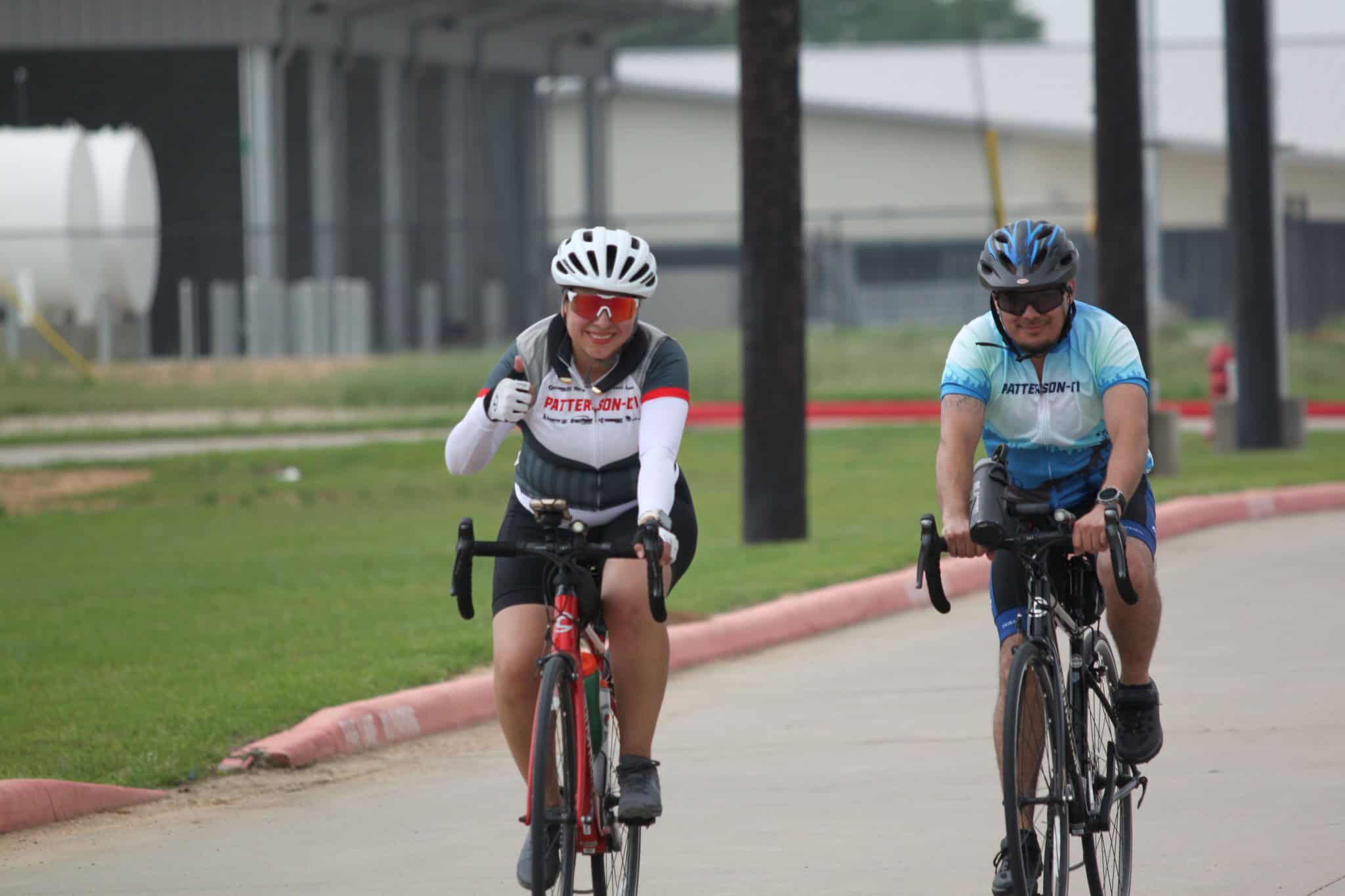 Cyclists enjoying a ride on Bluebonnet Express bike trail, showcasing scenic cycling in Texas.