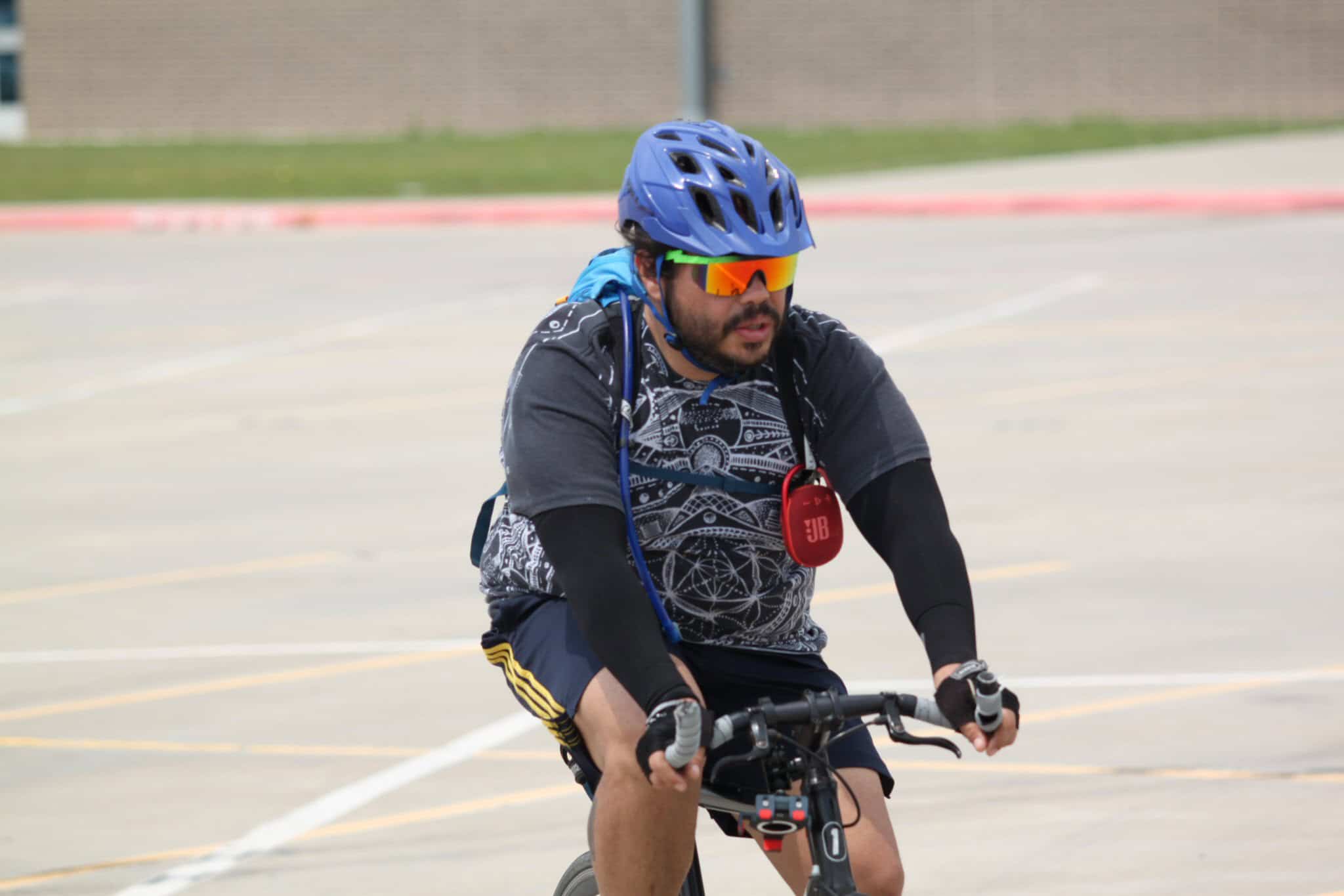 Bluebonnet Express cyclist wearing helmet and sunglasses during a ride.