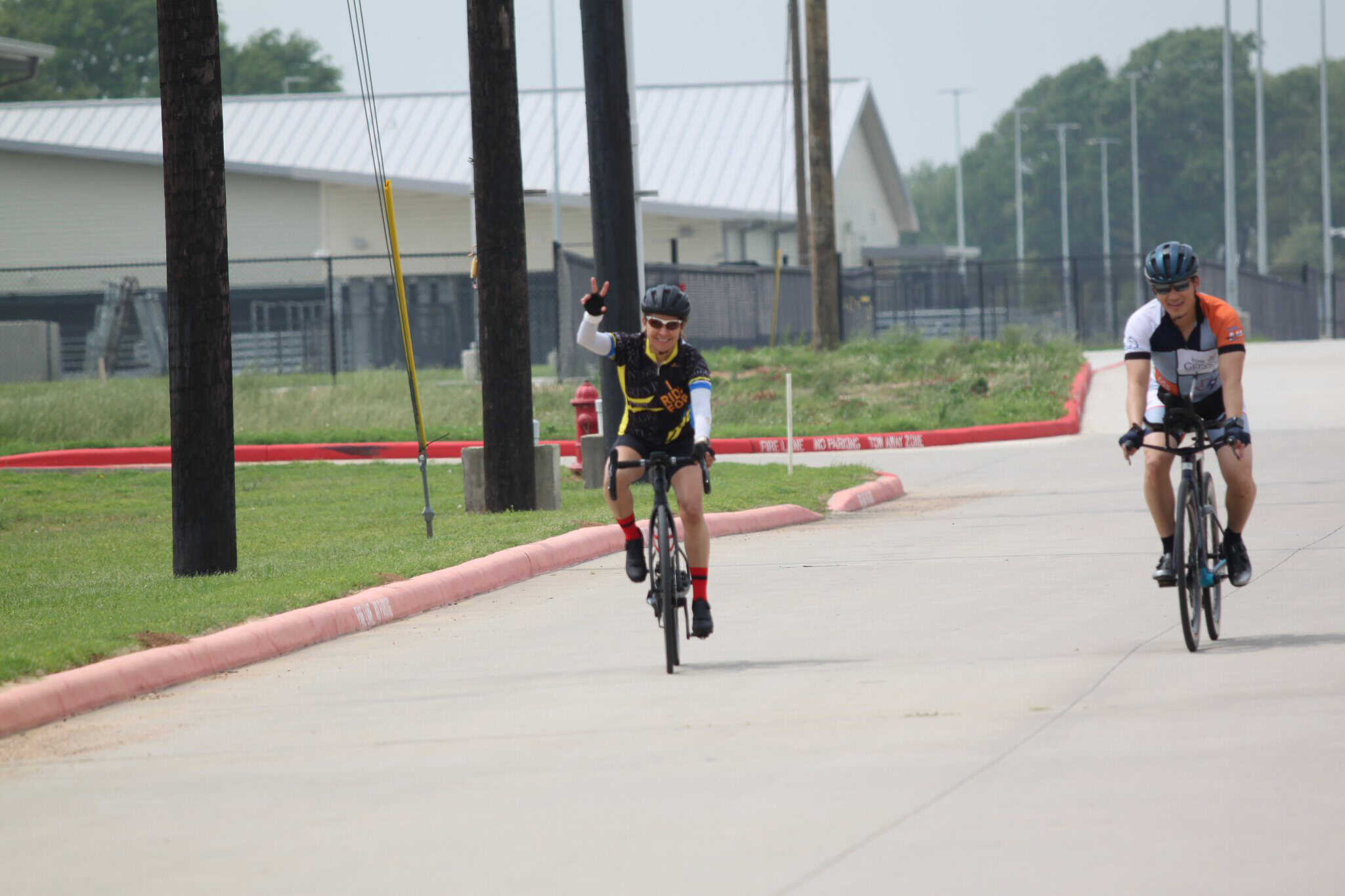 Bicycle riders enjoying outdoor cycling on a sunny day.