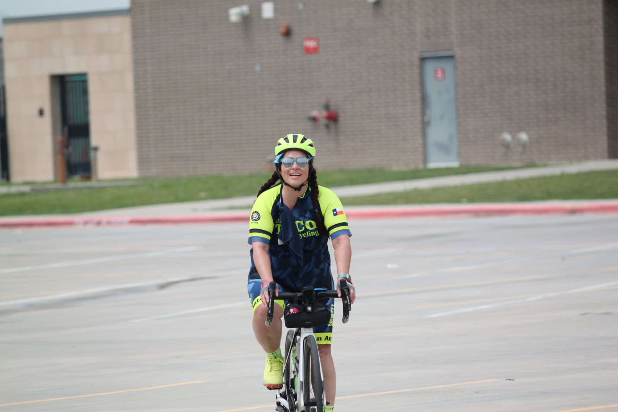 Vibrant cyclist enjoying the ride during Bluebonnet Express event in Texas.