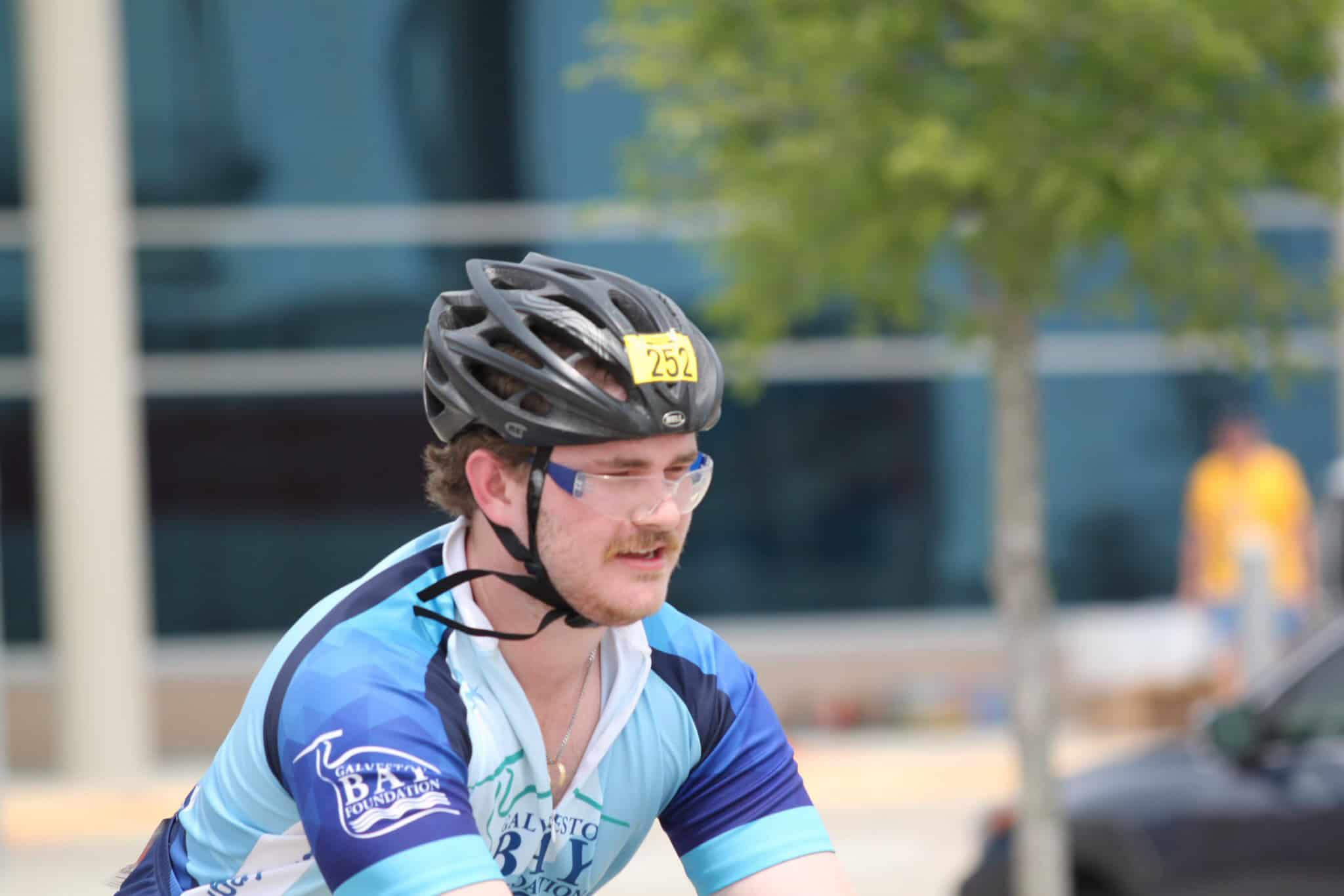 Bike rider at Bluebonnet Express cycling event, wearing helmet and sportswear.